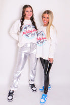 Vintage Rolling Stones concert sweatshirt featuring iconic band photo graphic and 'Live In Concert' text on the back, crafted from soft vintage washed fabric.