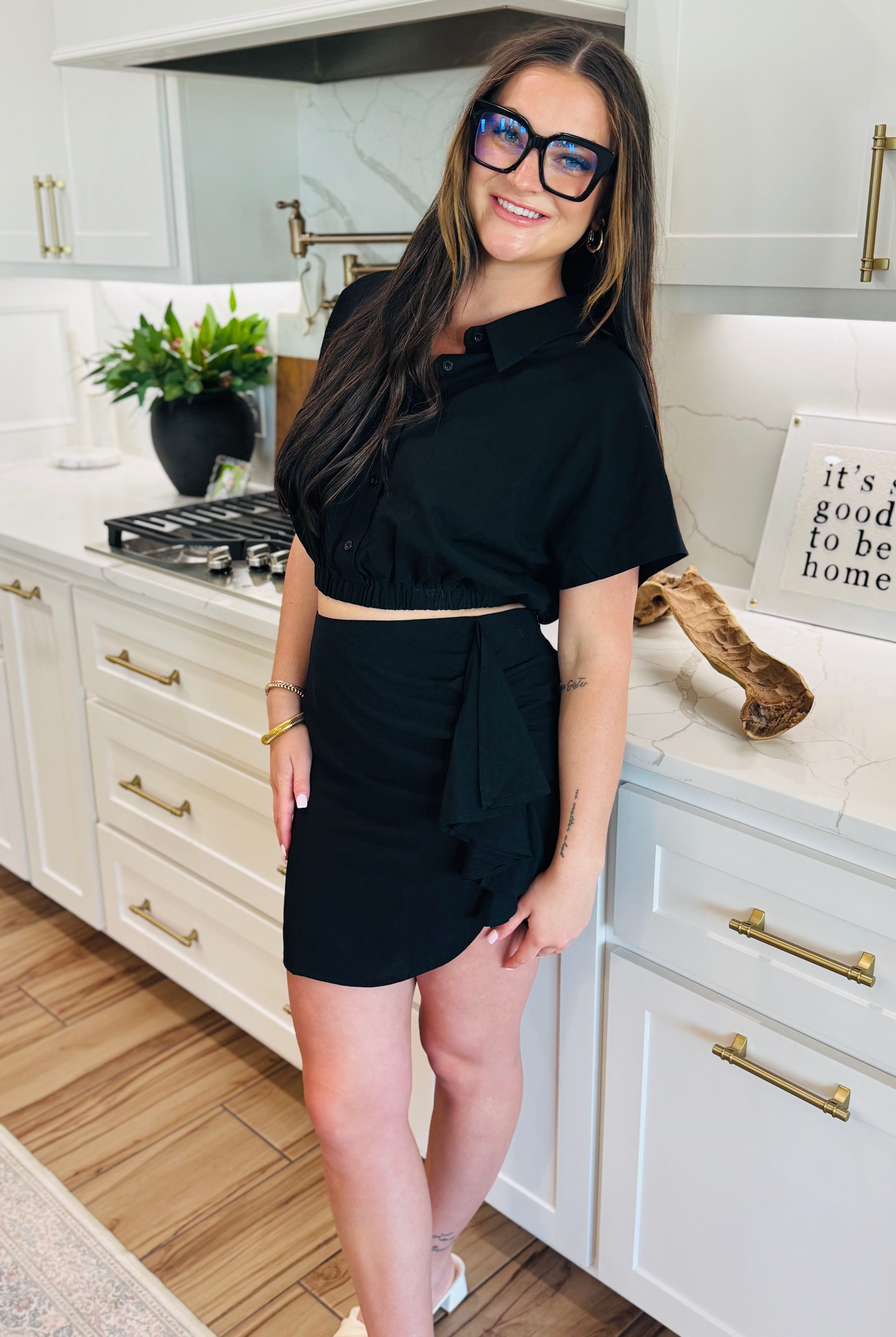 BLACK LINEN TWO PIECE SKIRT SET - Chic image of model wearing black linen two piece skirt set, perfect for any occasion, highlighting fashionable appeal.