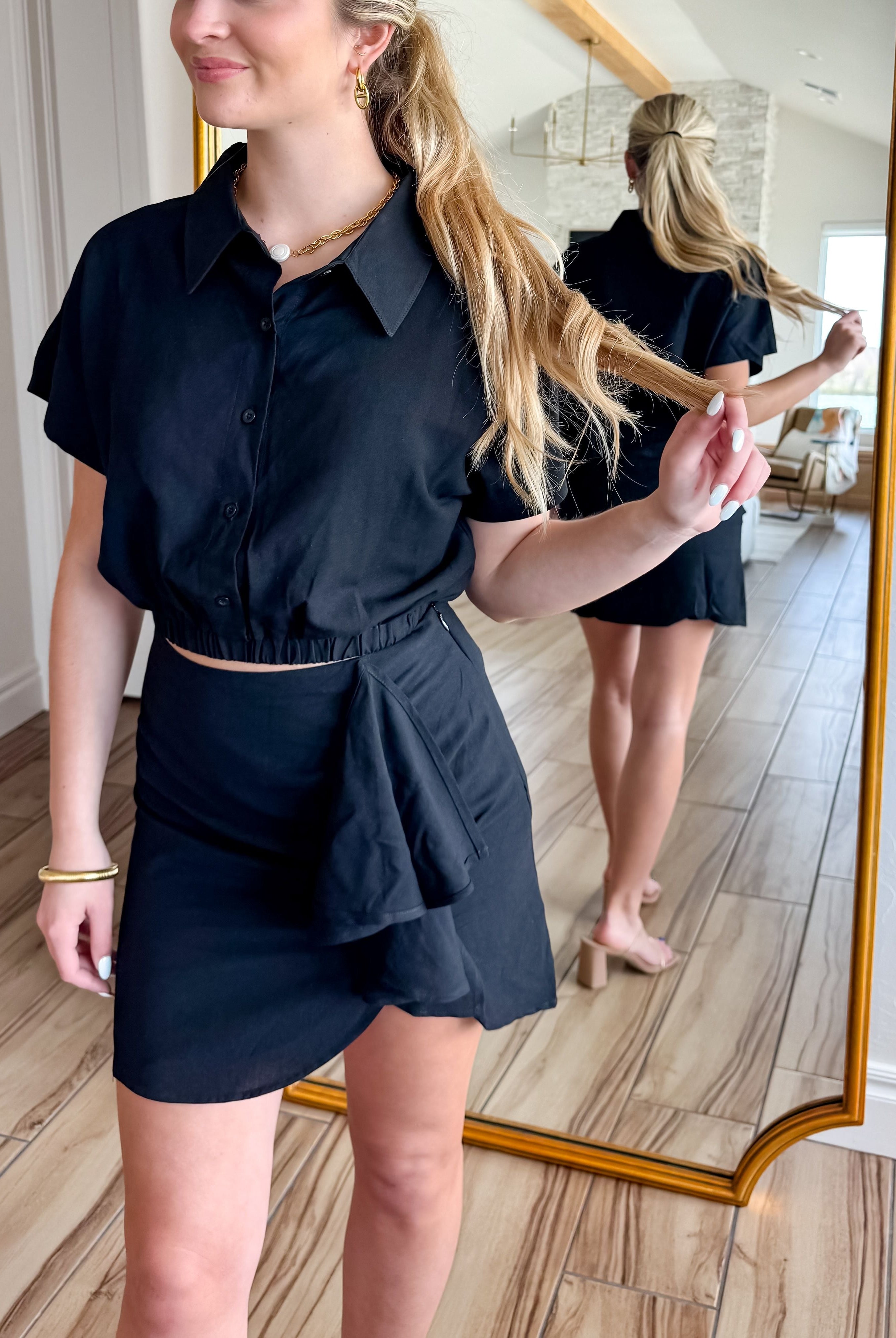 Stylish black linen two piece skirt set designed by Mable, showcasing a fitted skirt and loose-fit top, perfect for versatile styling.