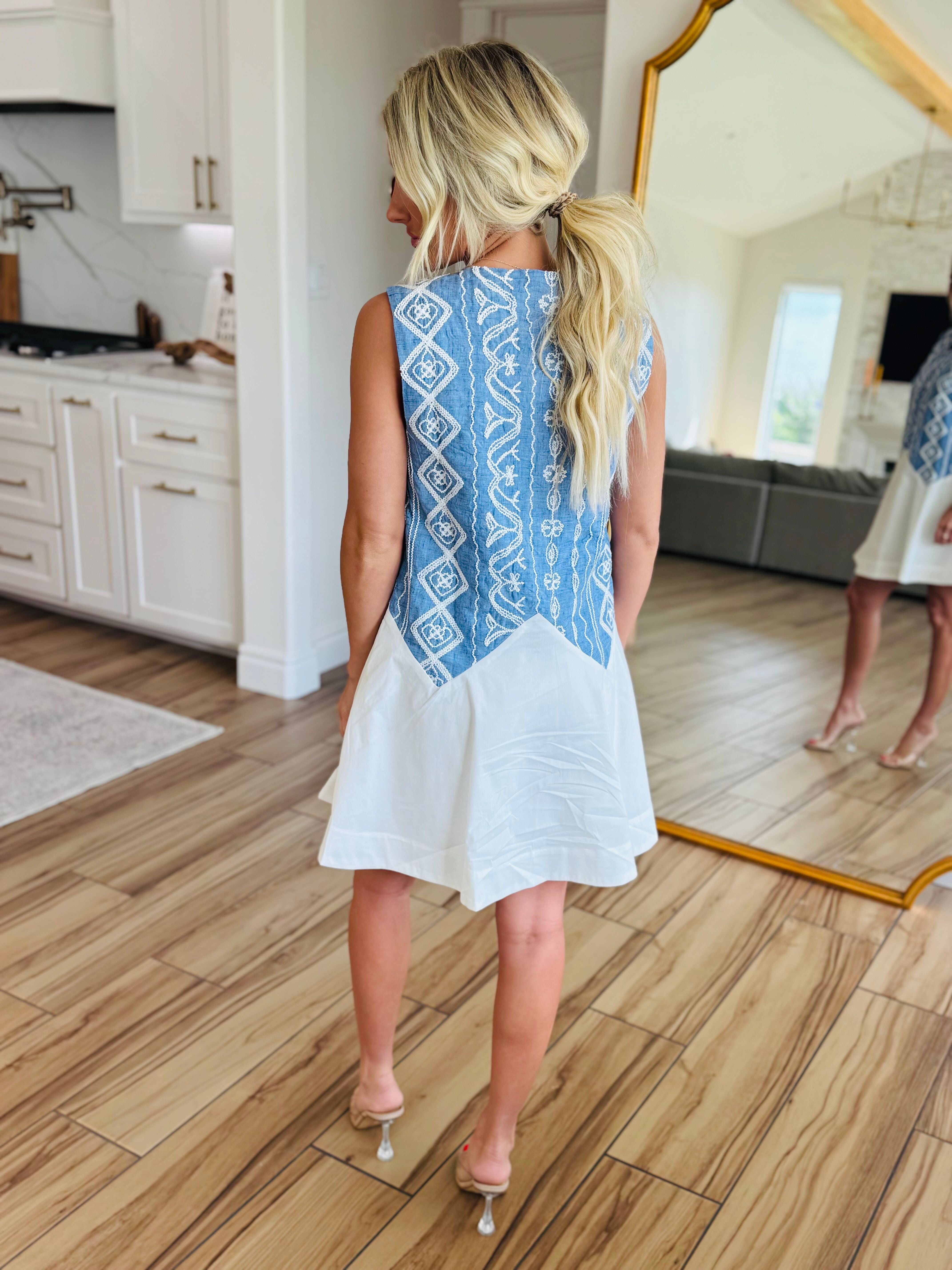Blue and White Embroidered Dress with Aztec detailing, featuring a flattering fit-and-flare silhouette, perfect for western chic style and summer events.