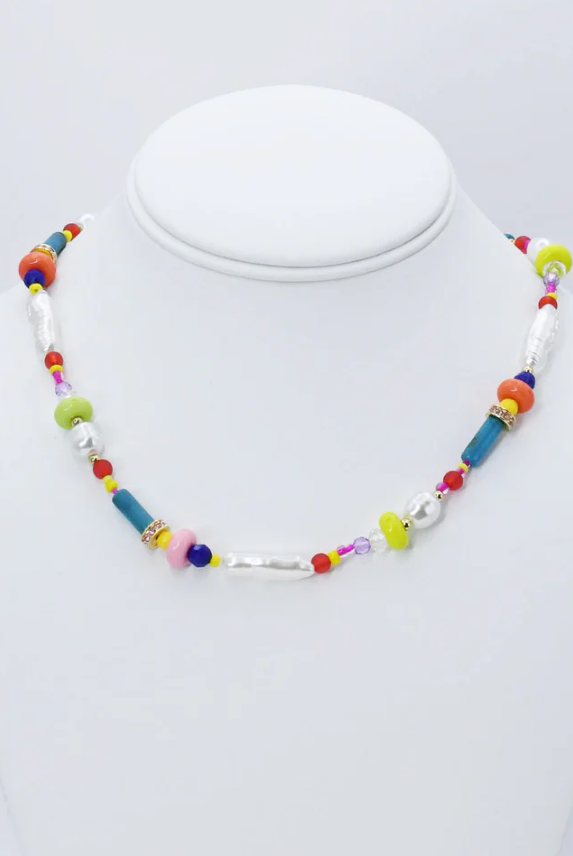 BEAD AND BLOOM NECKLACE featuring colorful beads for a statement piece, perfect for layering or wearing solo.