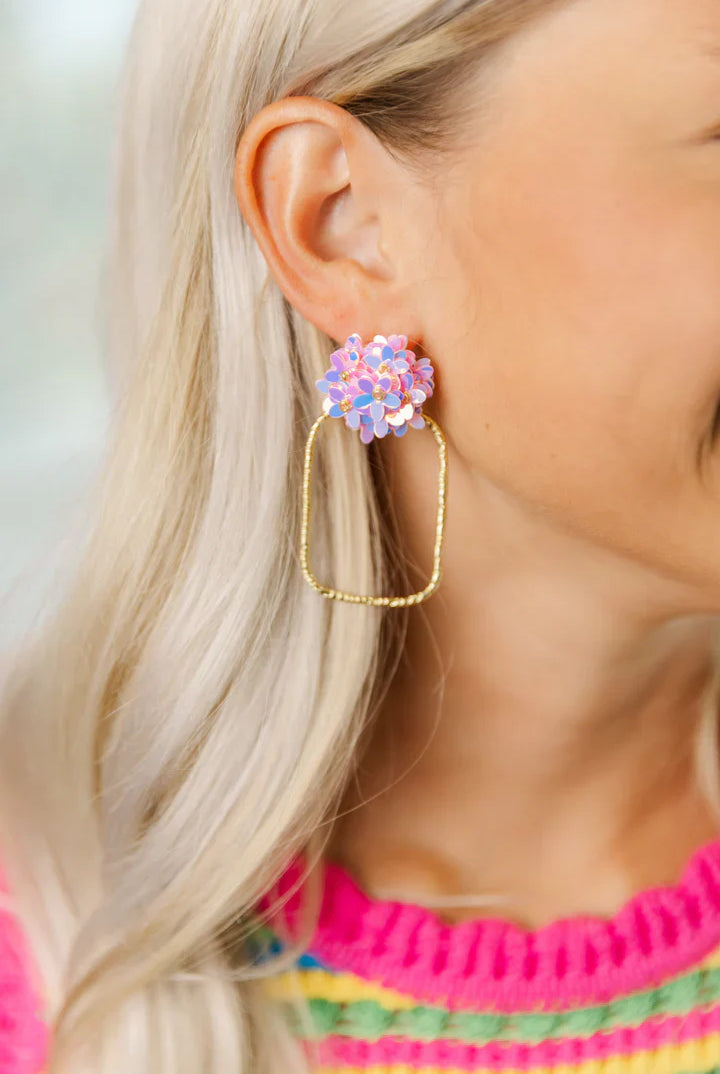 Stylish Iridescent Flower Top Hoops in Pink by Taylor Shaye, perfect for elegant or casual dressing.