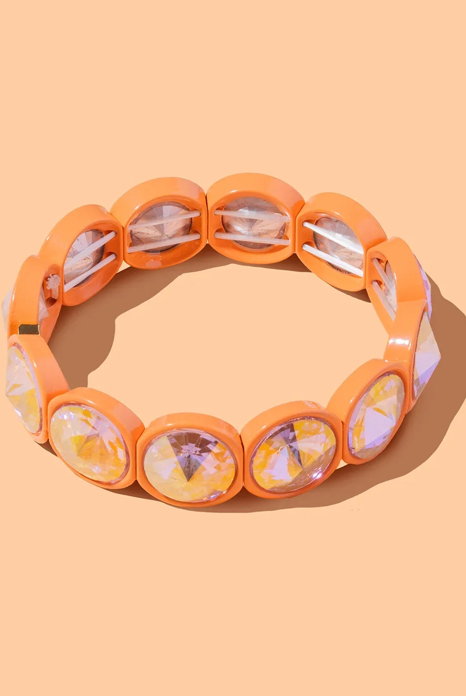 Close-up of the Elise Beaded Bracelet showcasing its stretch design and intricate details of enamel and stone elements for a chic accessory.