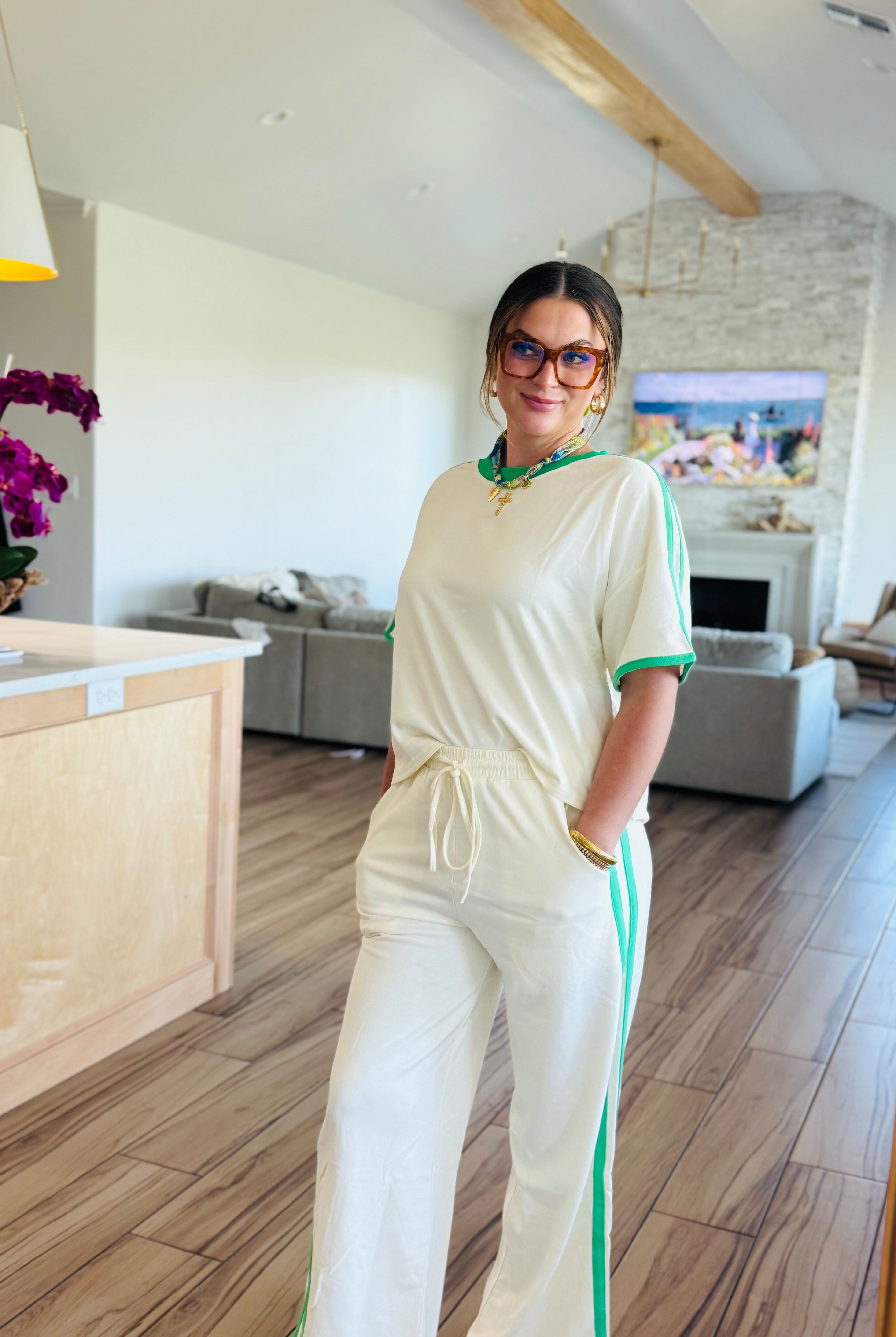 Full view of the ENTRO CREAM PANT SET, ideal for stylish relaxation and everyday wear, with a model showcasing the fit.