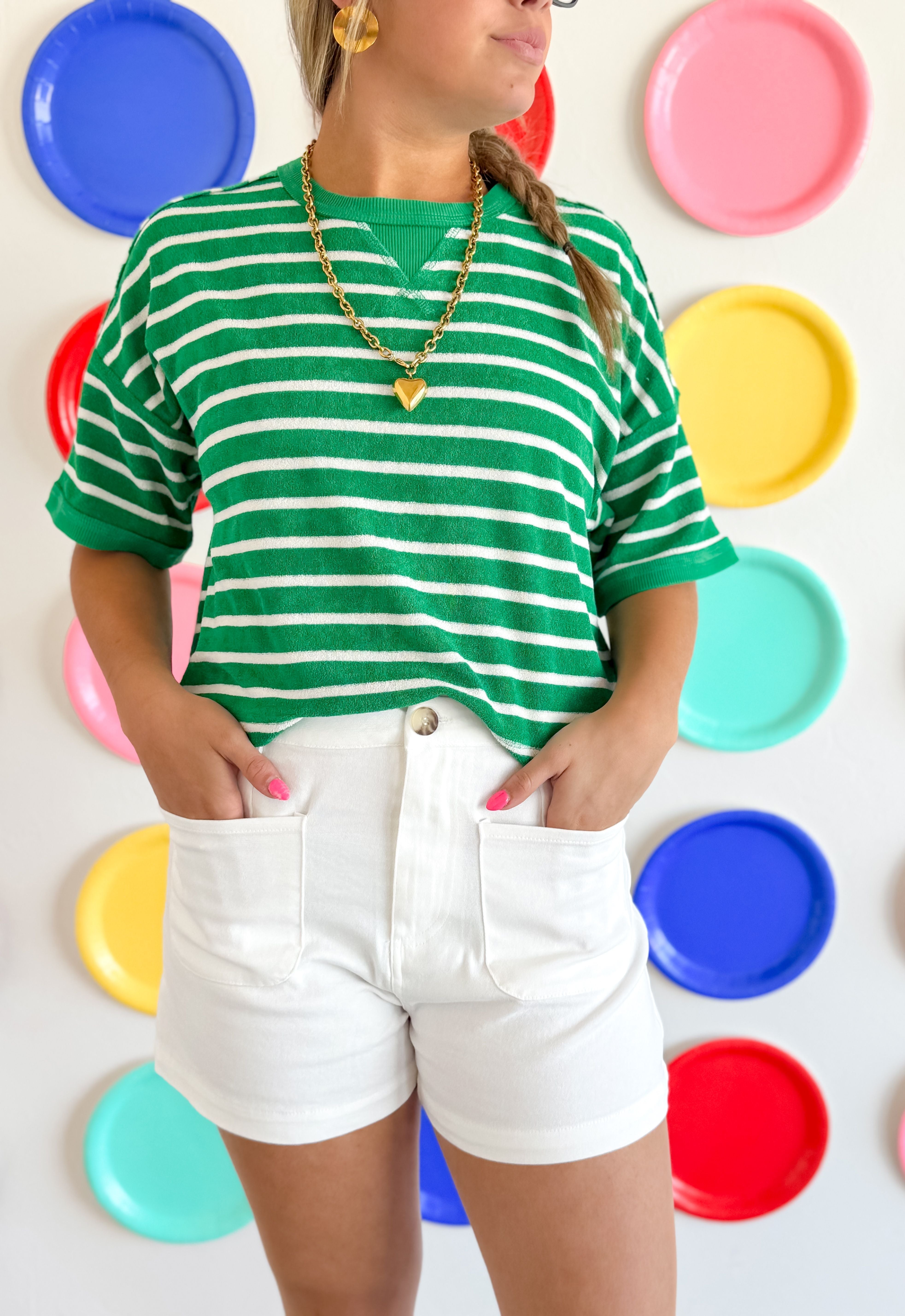 Stylish Entro White Woven Shorts displayed on a model, showcasing their comfortable fit and flattering cut, perfect for summer outfits.