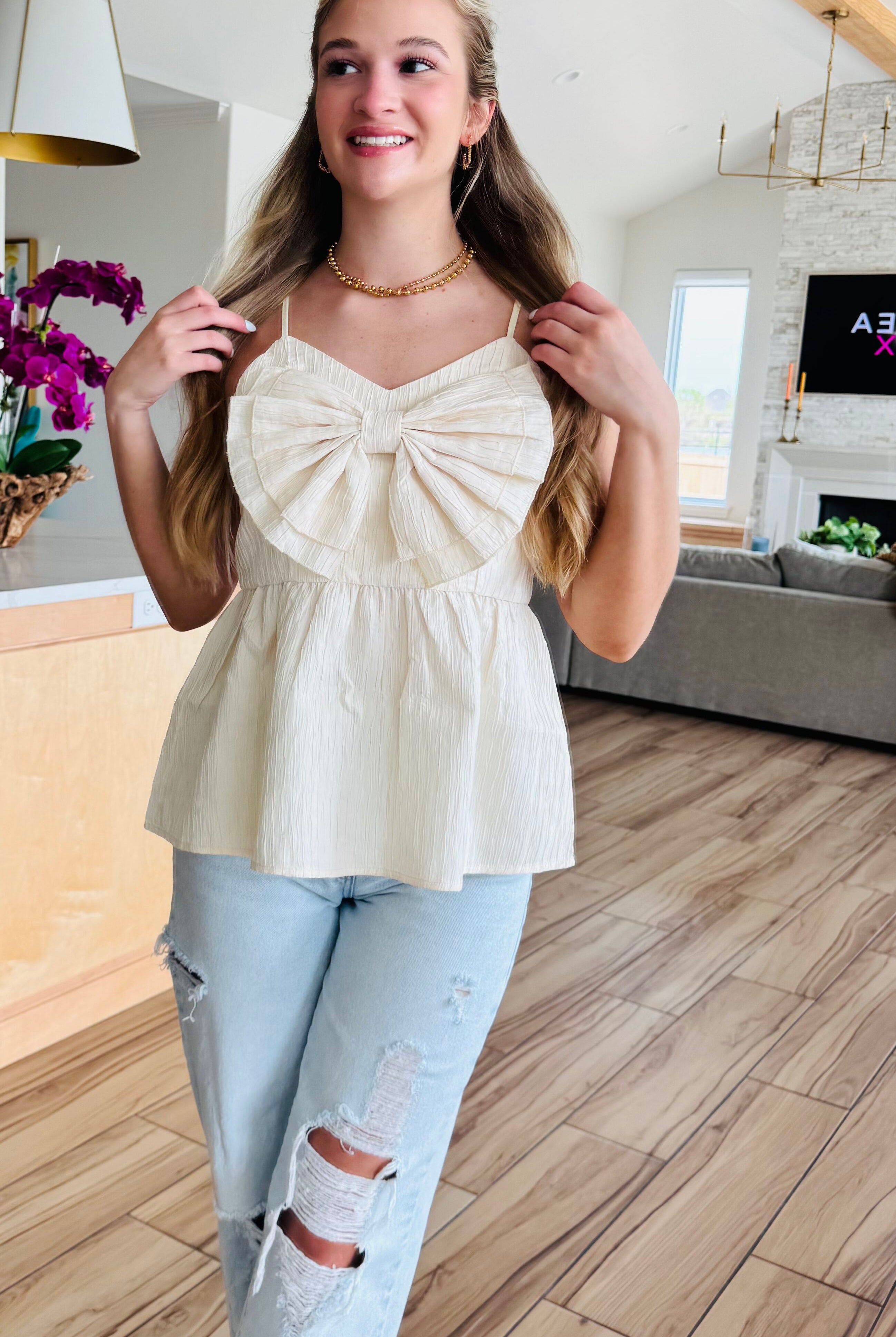 ECRU BABYDOLL TEXTURED BOW TOP from Heyson, showcasing a flattering fit perfect for everyday wear, styled with elegant textures and a sexy bow detail.