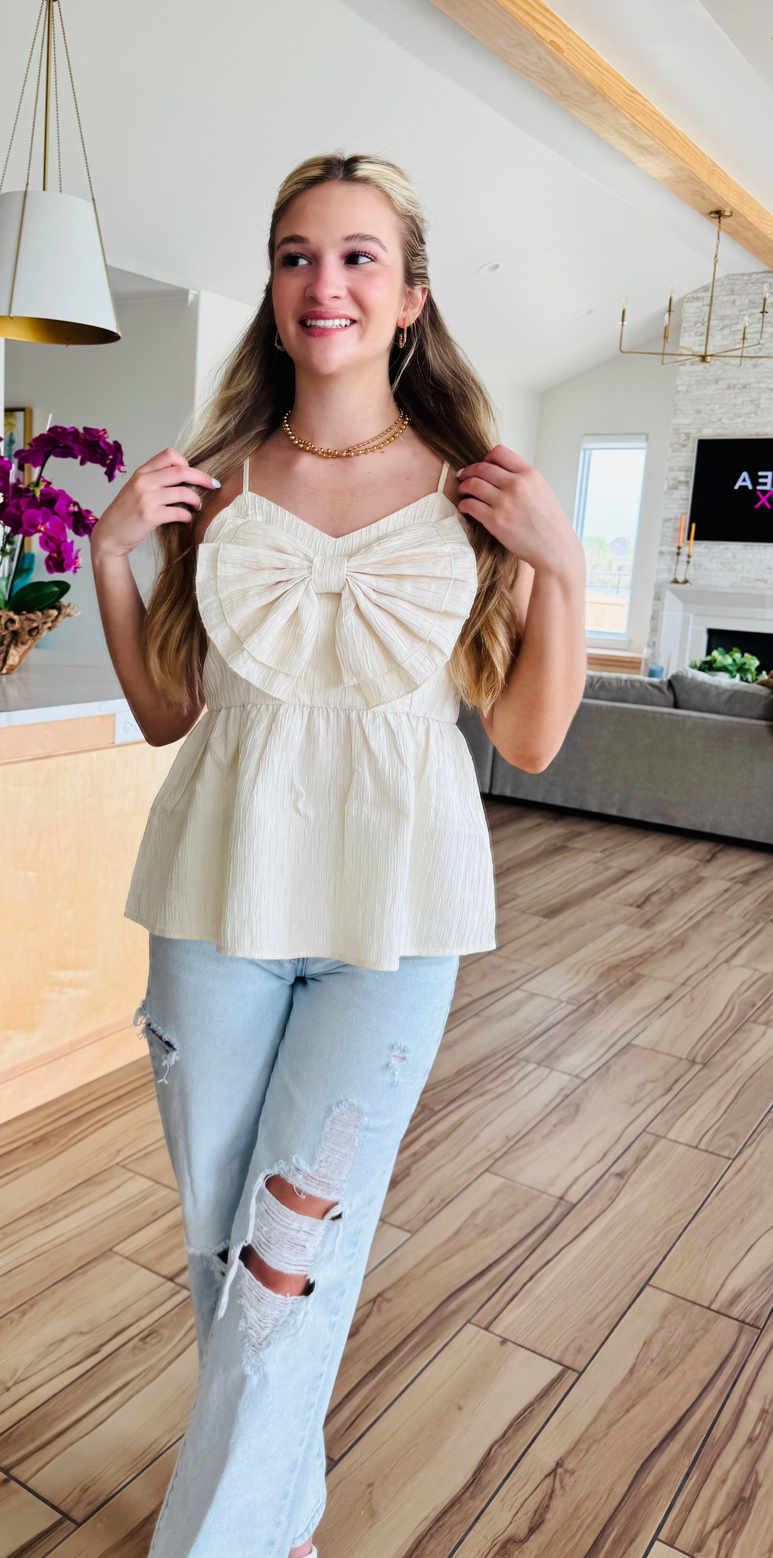 ECRU BABYDOLL TEXTURED BOW TOP from Heyson, showcasing a flattering fit perfect for everyday wear, styled with elegant textures and a sexy bow detail.