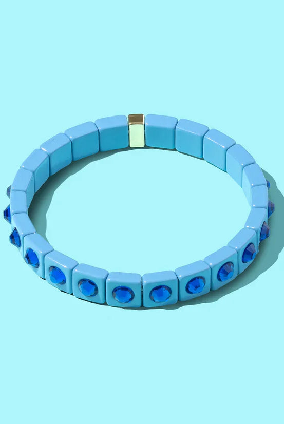 Close-up view of the Maeve Enamel Bracelet - Elegant Stretch Bracelet featuring a modern design that adds sophistication to any outfit.