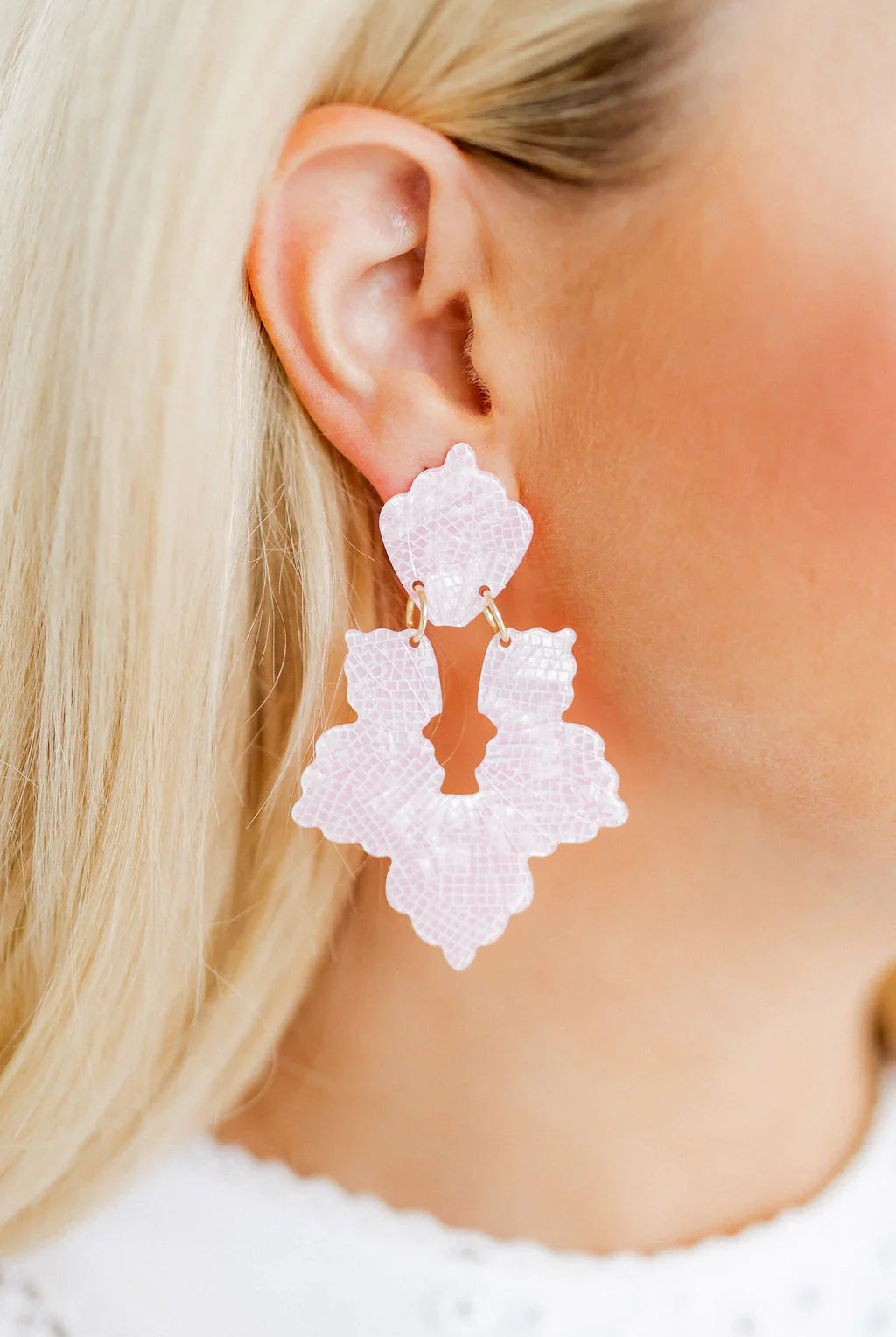 Close-up view of Michelle Statement Earrings - Disco Pink, made from 100% surgical-grade stainless steel and eco-friendly acetate, designed for comfort and style.
