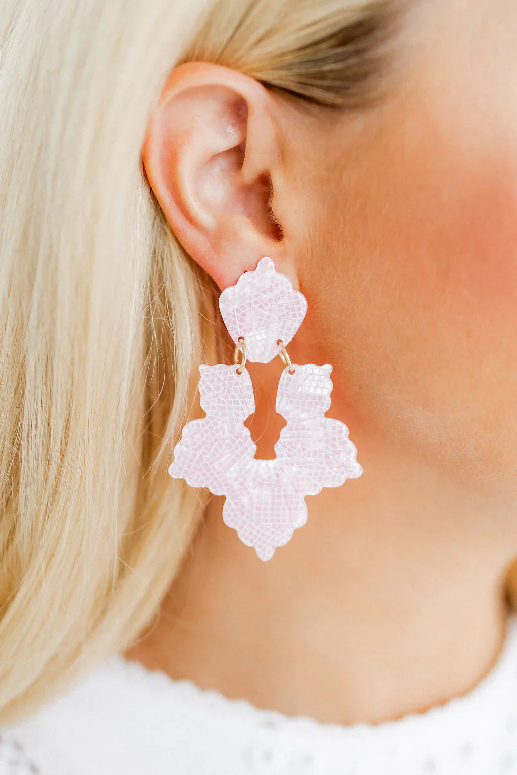 Close-up view of Michelle Statement Earrings - Disco Pink, made from 100% surgical-grade stainless steel and eco-friendly acetate, designed for comfort and style.