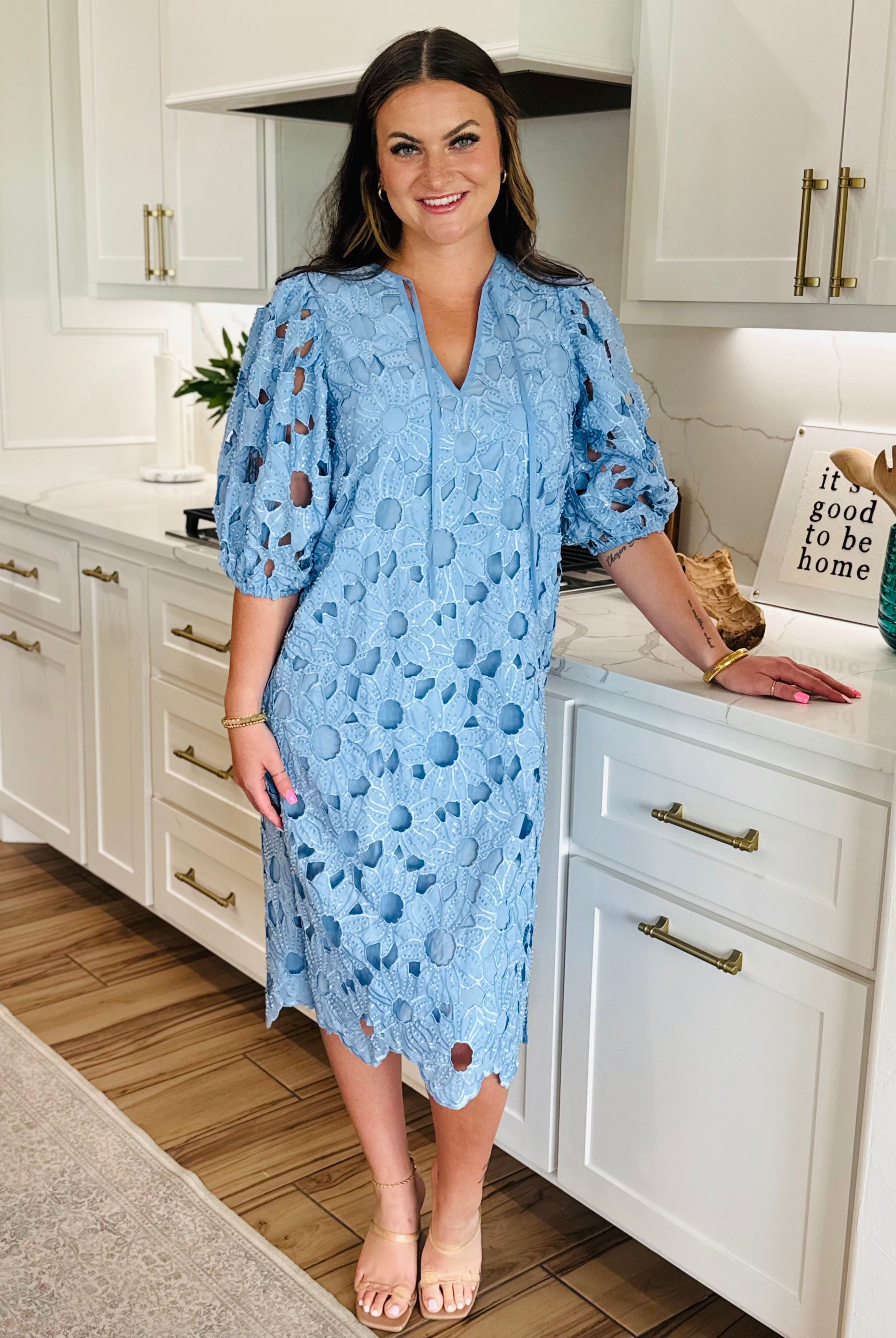 Pamela Poppy Maxi Dress by Buddy Love styled with sandals, ideal for romantic dinners and chic outings.