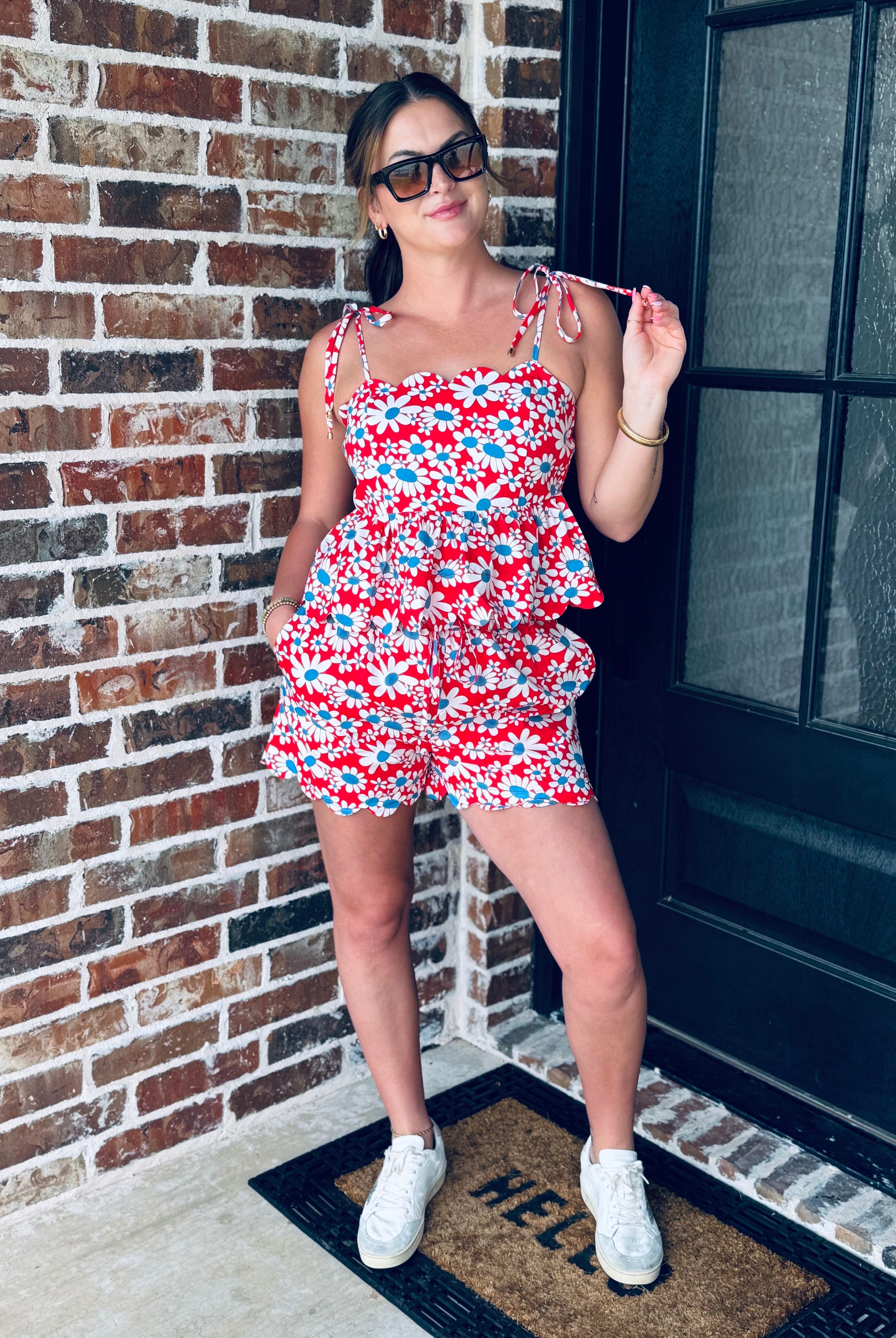 Stylish model wearing the Red, White and Blue Floral Matching Short Set showcasing adjustable tie straps and scalloped neckline.