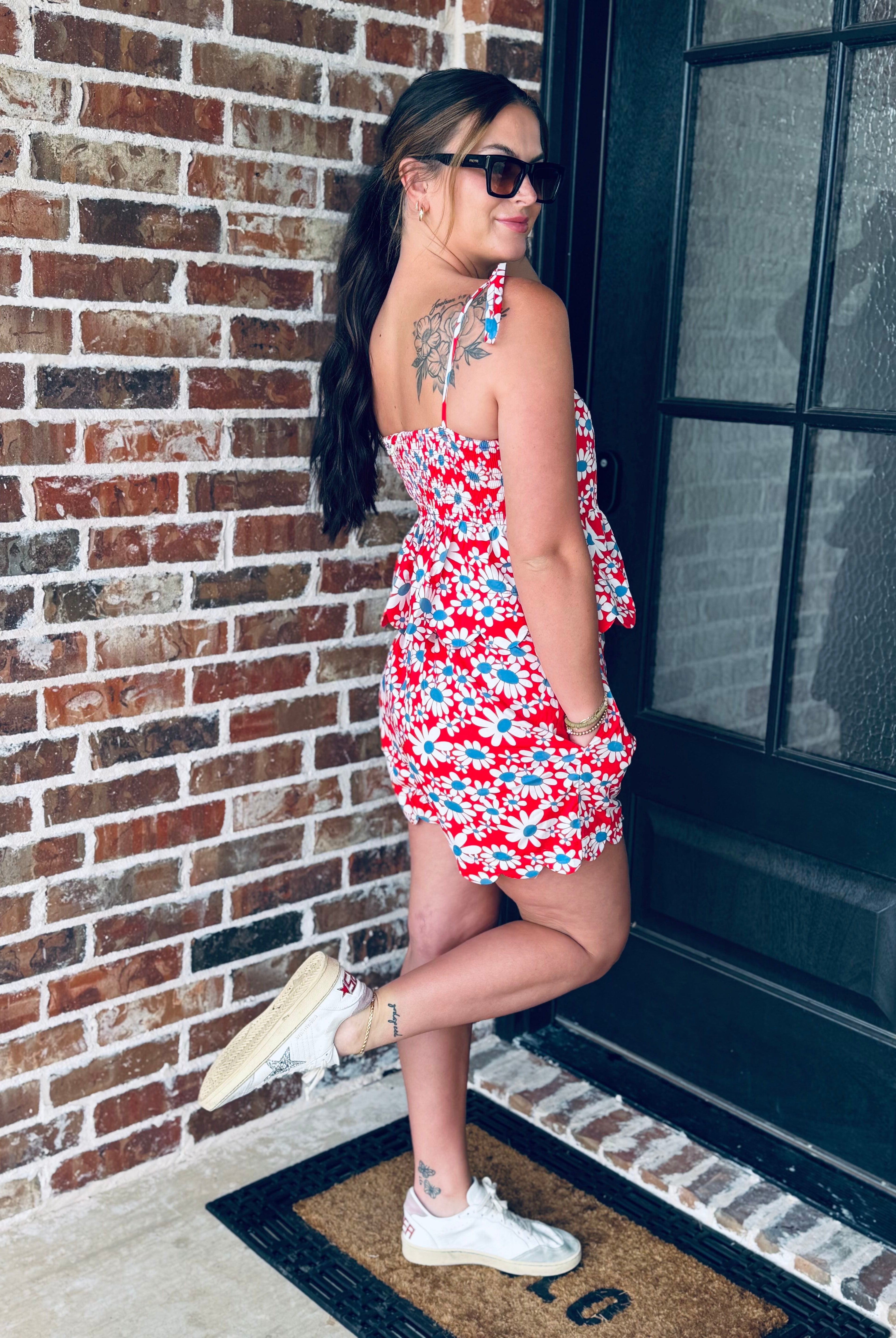 Flat lay of the Red, White and Blue Floral Matching Short Set highlighting the vibrant floral pattern and comfortable elastic waistband shorts.