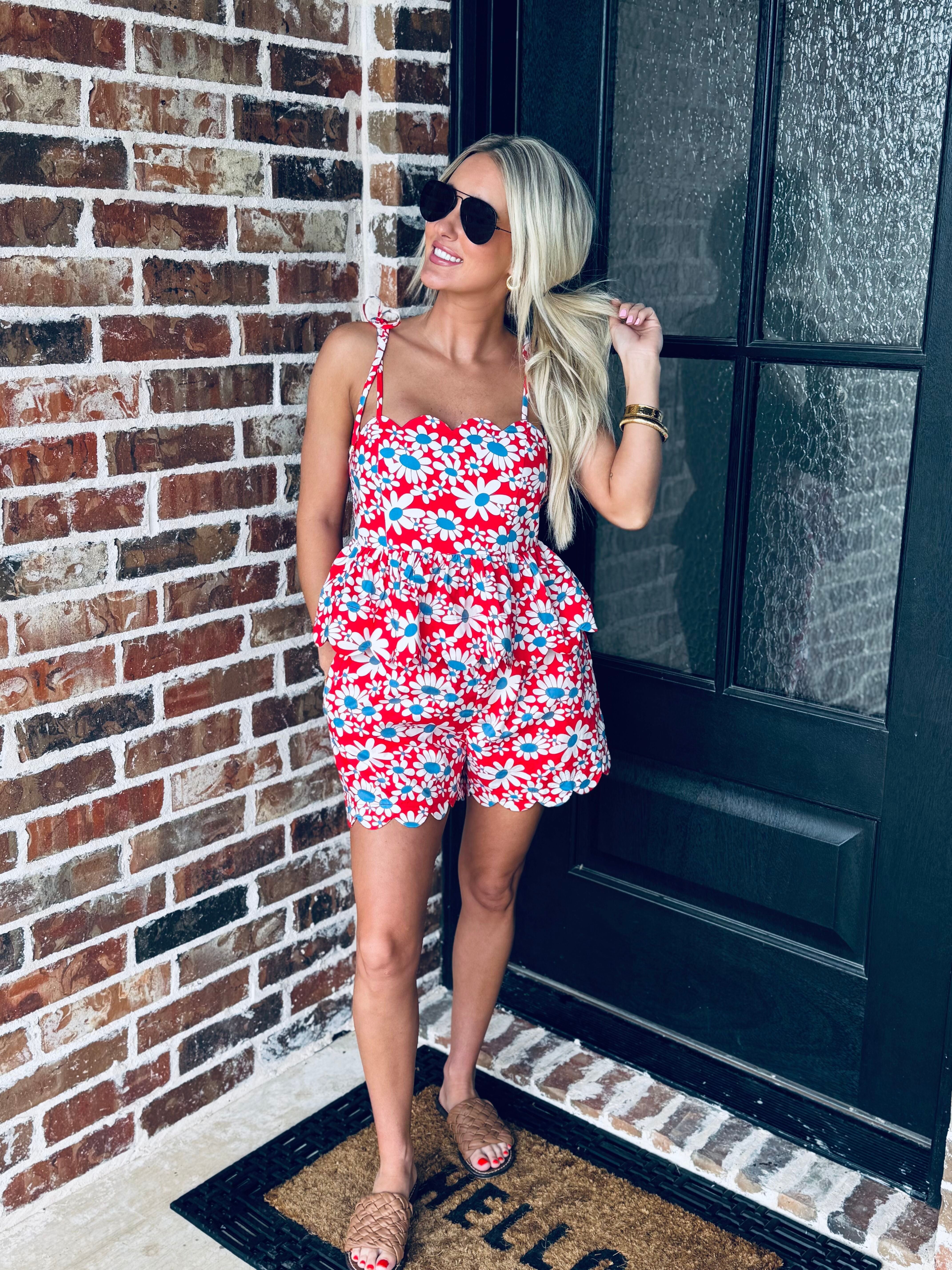 Model wearing the Red, White and Blue Floral Matching Short Set with sunglasses and sneakers, perfect for casual summer celebrations.
