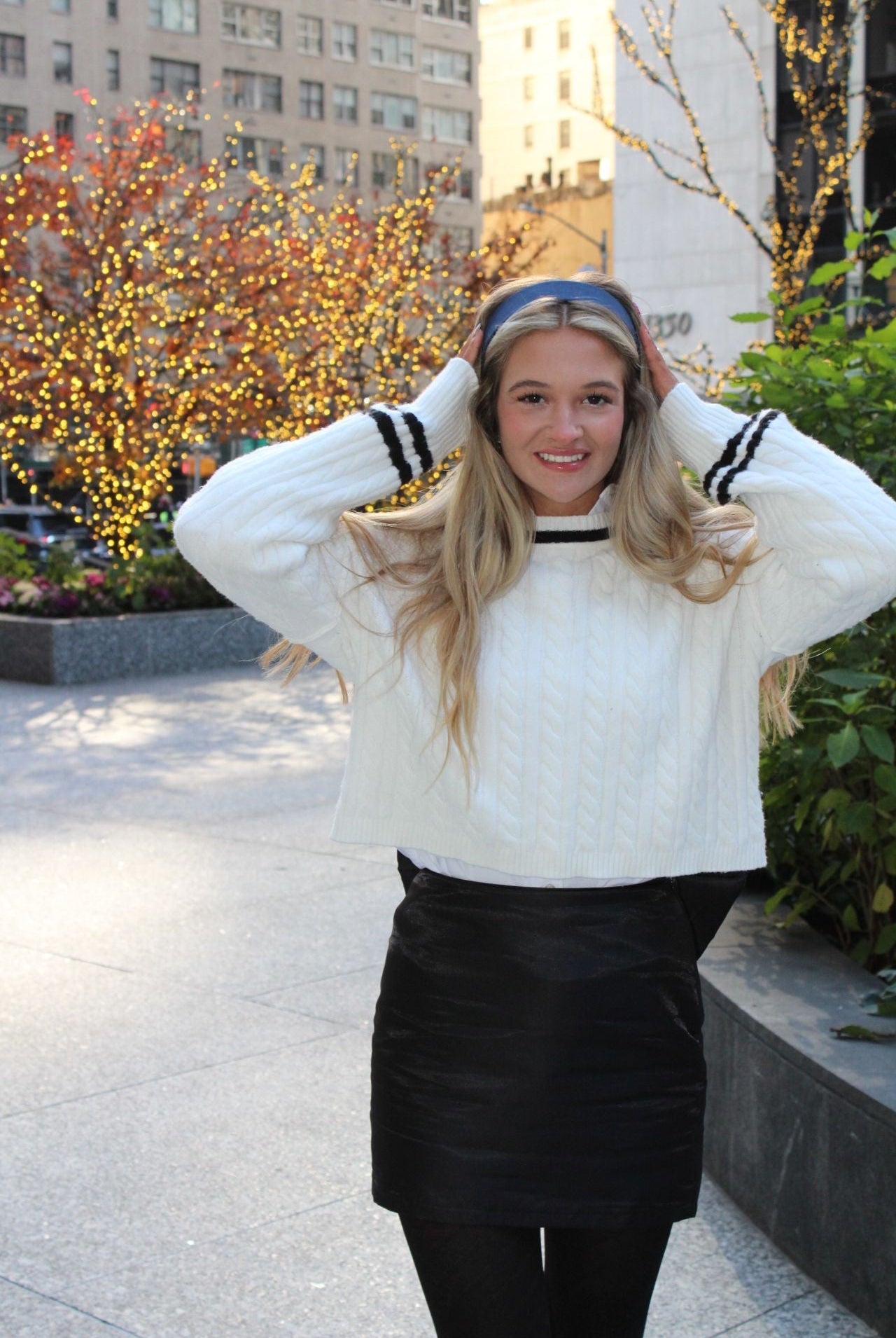 Eye-catching Black Bow Skirt displayed elegantly, highlighting its unique bow feature and sleek silhouette.