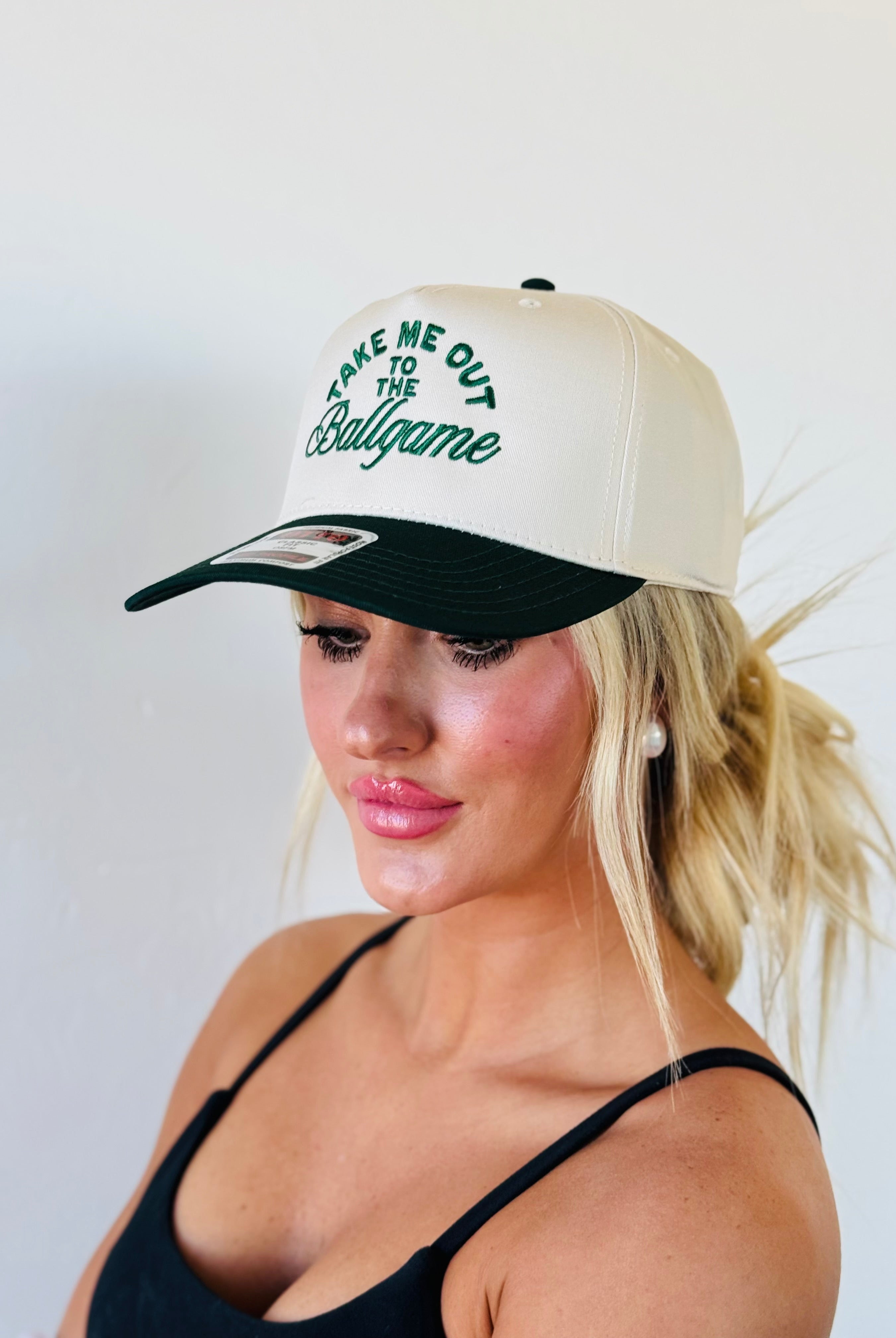 TAKE ME OUT TO THE BALLGAME TRUCKER HAT in stylish green and natural design, perfect for baseball lovers.