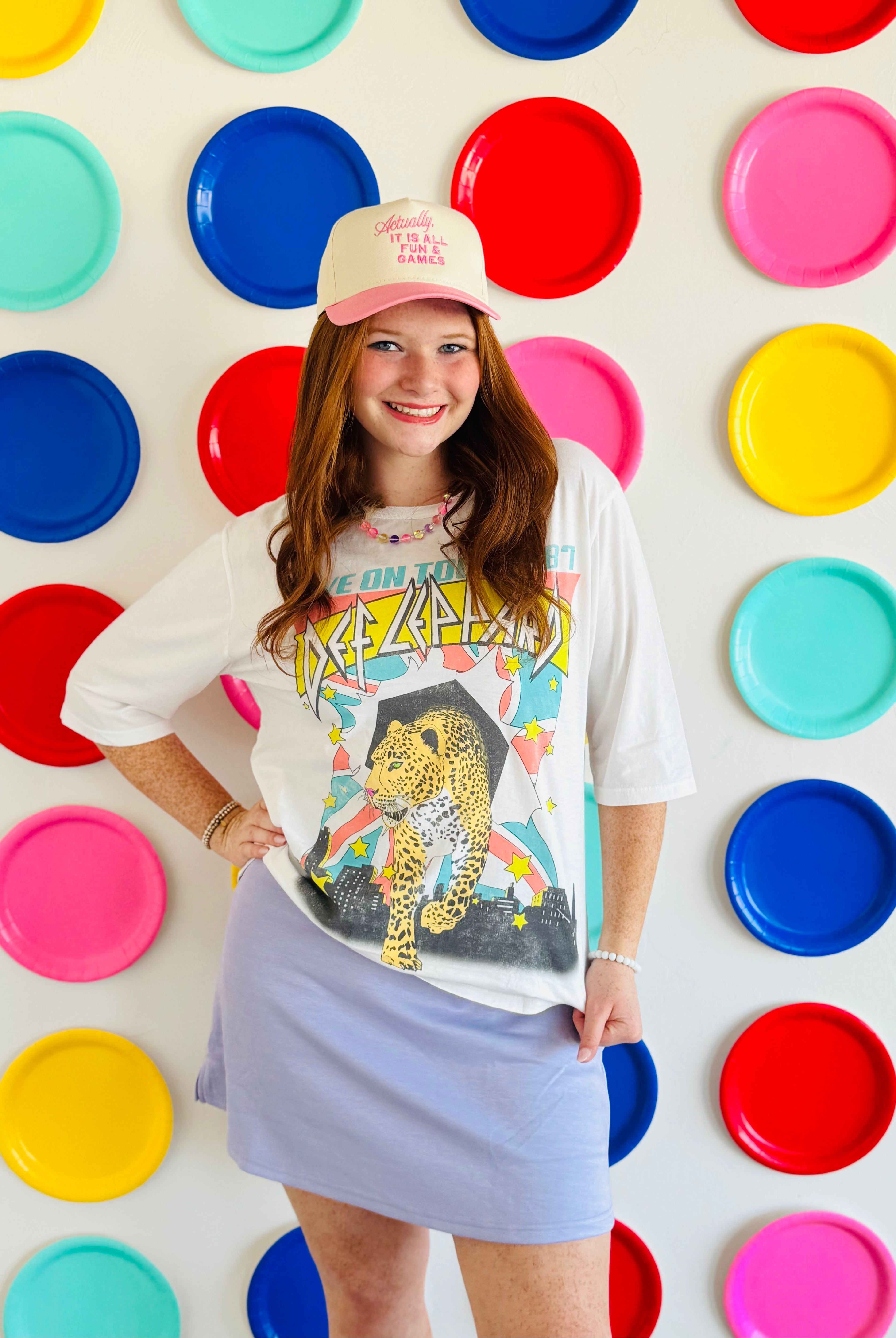 Lilac Athletic Skort by Umgee shown on display, featuring a sleek design and breathable fabric for ultimate comfort during workouts.