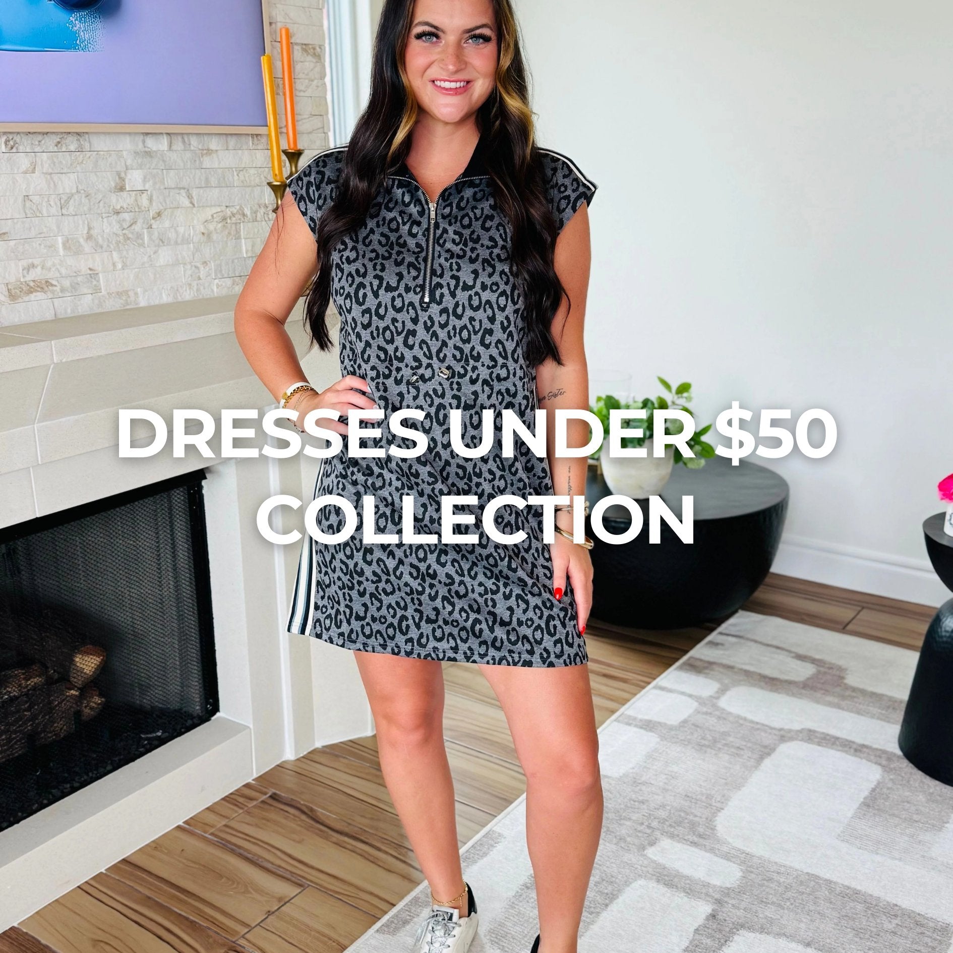 Stylish and affordable black Charlotte shift dress with contrast neckline from the Dresses Under $50 collection at Aurea Lux, perfect for versatile day and evening wear.