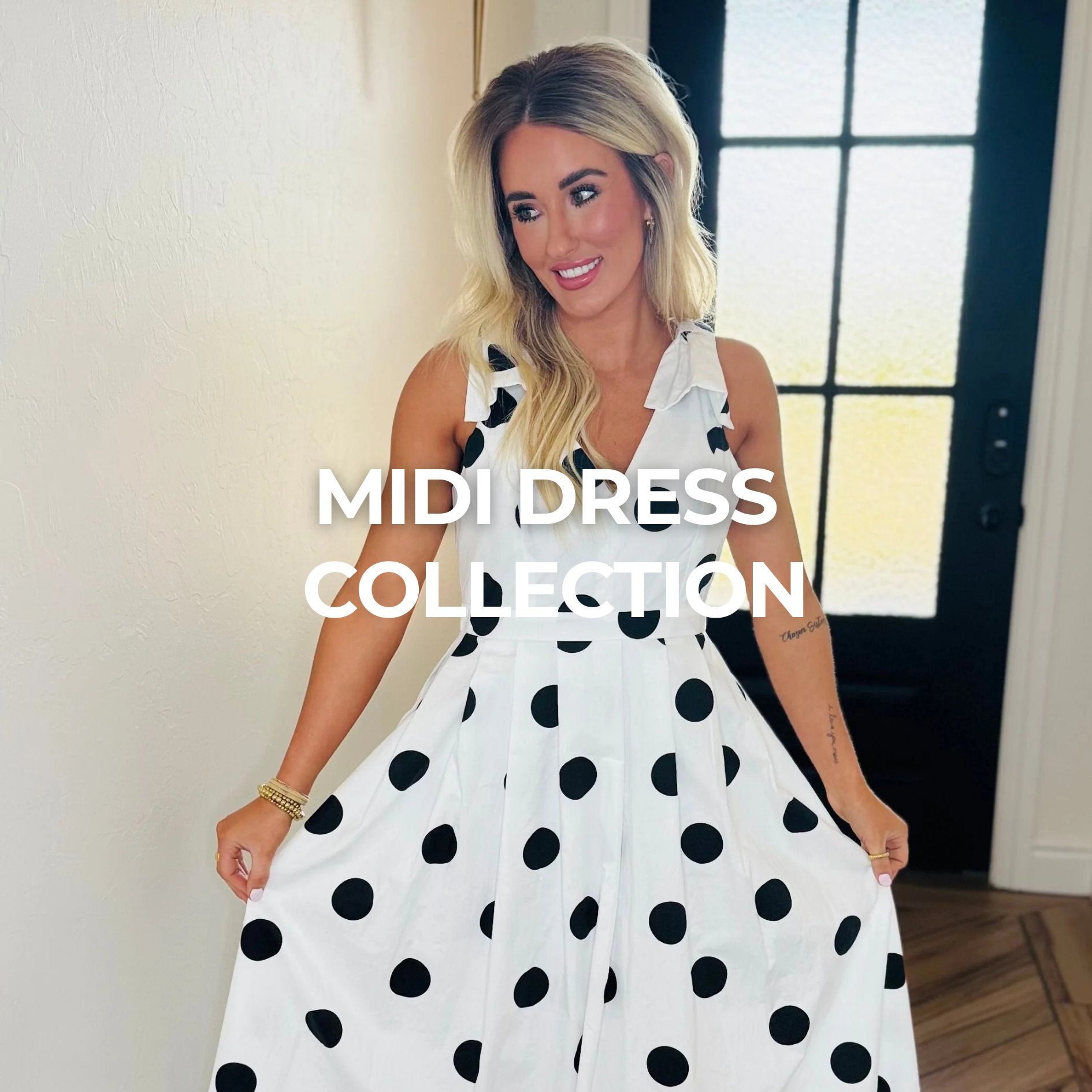 Gorgeous Midi Dress from our Midi Dress Collection featuring the Entro Black Charlotte Shift Dress, elegantly designed with a contrast neckline for a chic and sophisticated look.