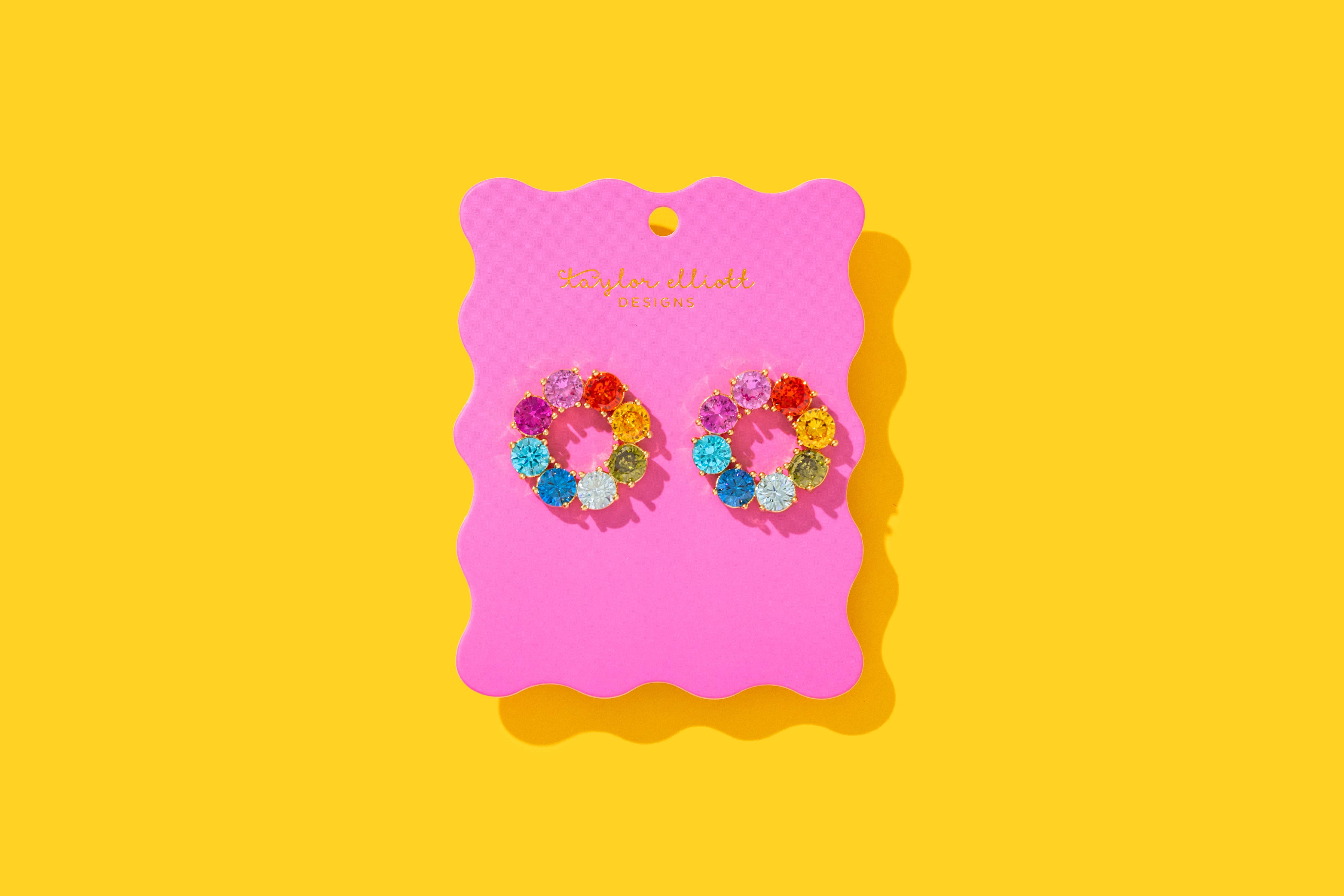 Stunning drop earrings - Circles with colorful gems by Taylor Elliott Designs, perfect for adding sparkle to any jewelry collection.