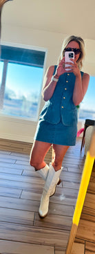 Denim Vest and Skort Set with Gold Buttons - Stylish outfit perfect for concerts and brunch, showcasing chic denim and luxe gold details.