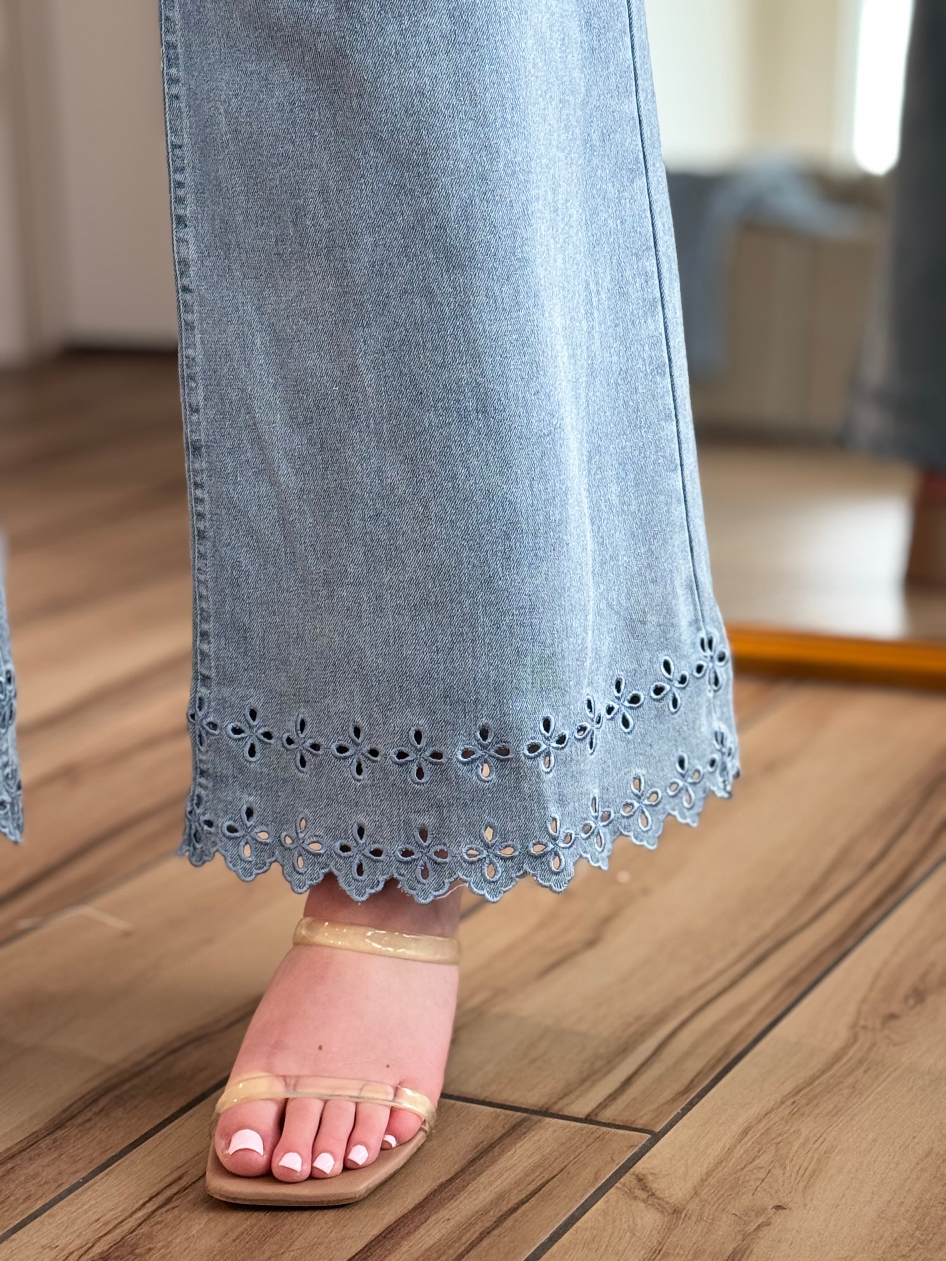 Close-up detail of the scalloped hem on the Bluebell Scallop Denim Jeans – Light Wash by ENTRO.