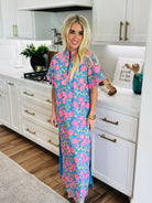 Model wearing the Leighton Pansy Maxi Dress by Buddy Love, perfect for special events with its relaxed fit and gorgeous length.