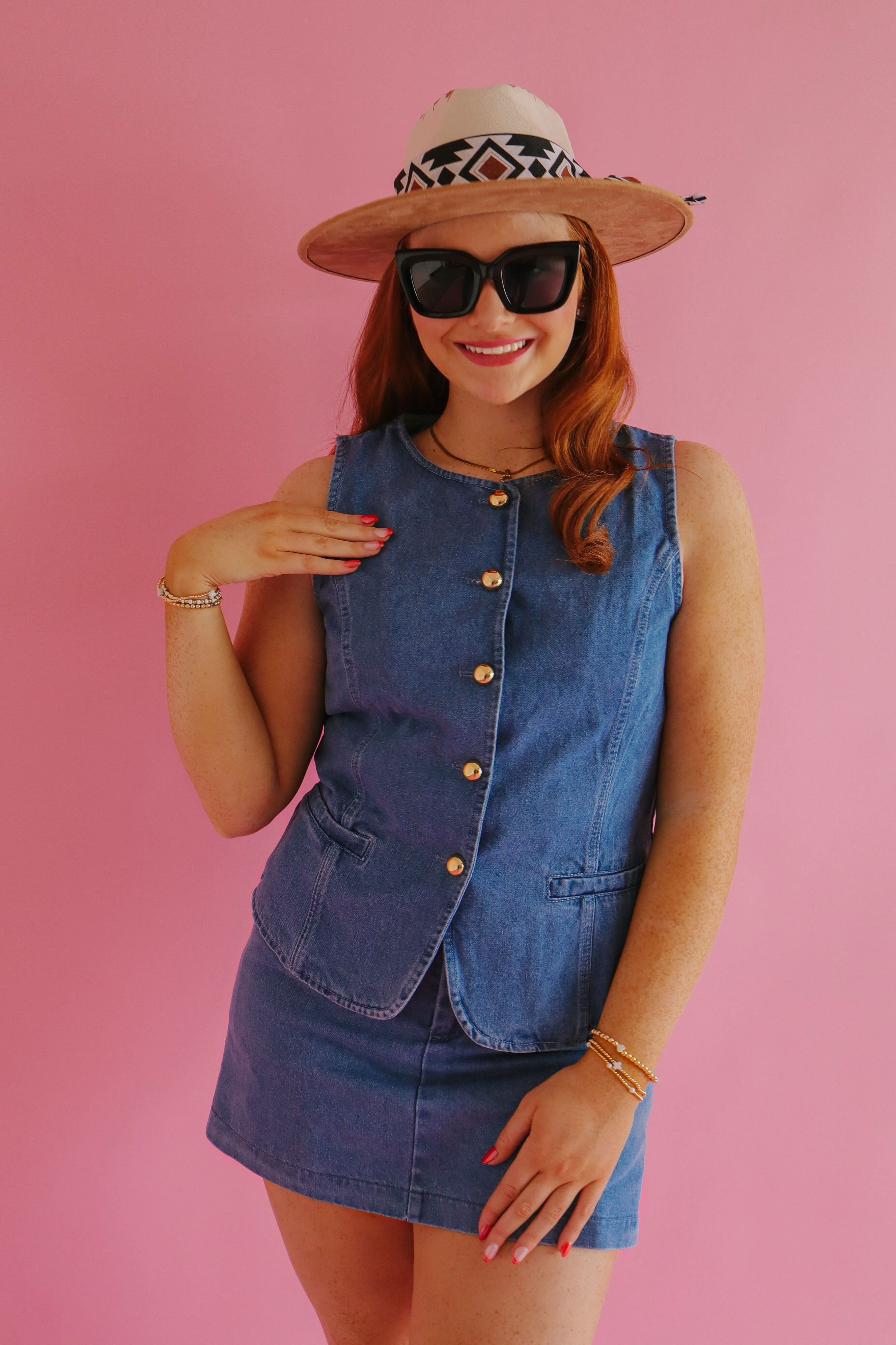 Stylish Denim Vest and Skort Set with Gold Buttons by Entro, perfect for versatile fashion choices.