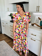 Miranda Puff Sleeve Maxi Dress by Buddy Love featuring delicate spring florals and playful puff sleeves.