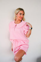 Chic Butter Soft Pink Shorts showcasing a vibrant pink color and feminine scalloped edges, a must-have addition to your wardrobe.