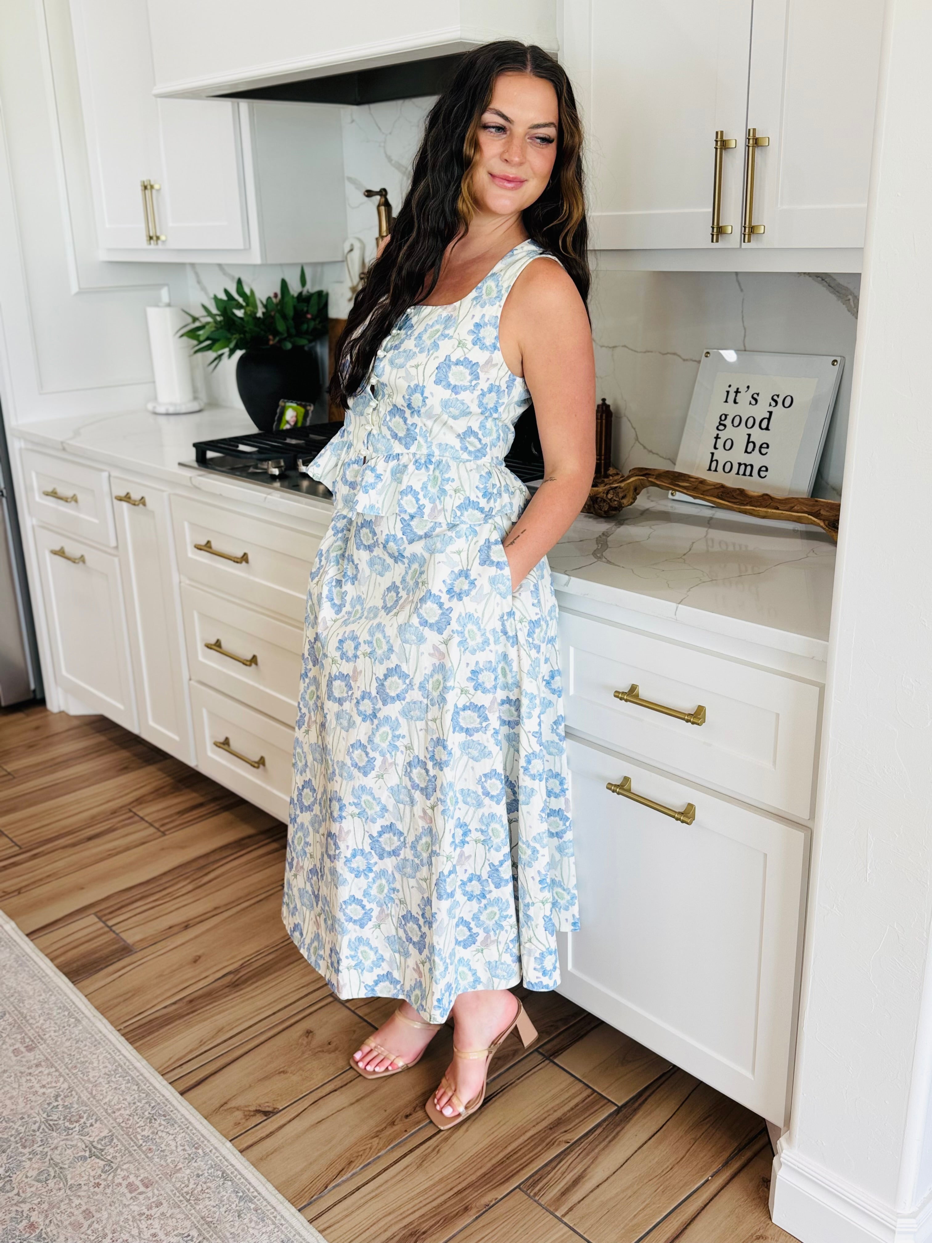 Close-up of the subtle floral pattern on the ENTRO Southern Belle Blue Floral Maxi Skirt, showcasing its lightweight fabric and sophisticated elegance.