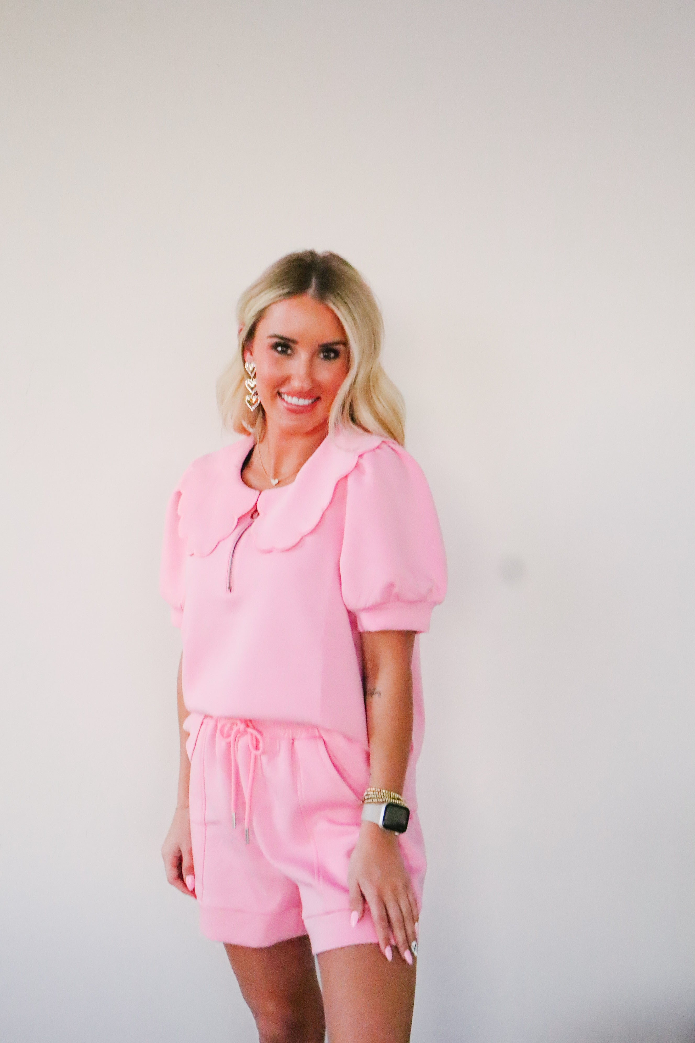 Comfortable Butter Soft Pink Shorts with an elastic drawstring waist, ideal for casual wear and staying stylish throughout the day.