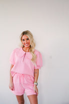 Butter Soft Pink Shorts from Entro, featuring a luxurious buttery material and a stylish scalloped design, perfect for summer outfits.