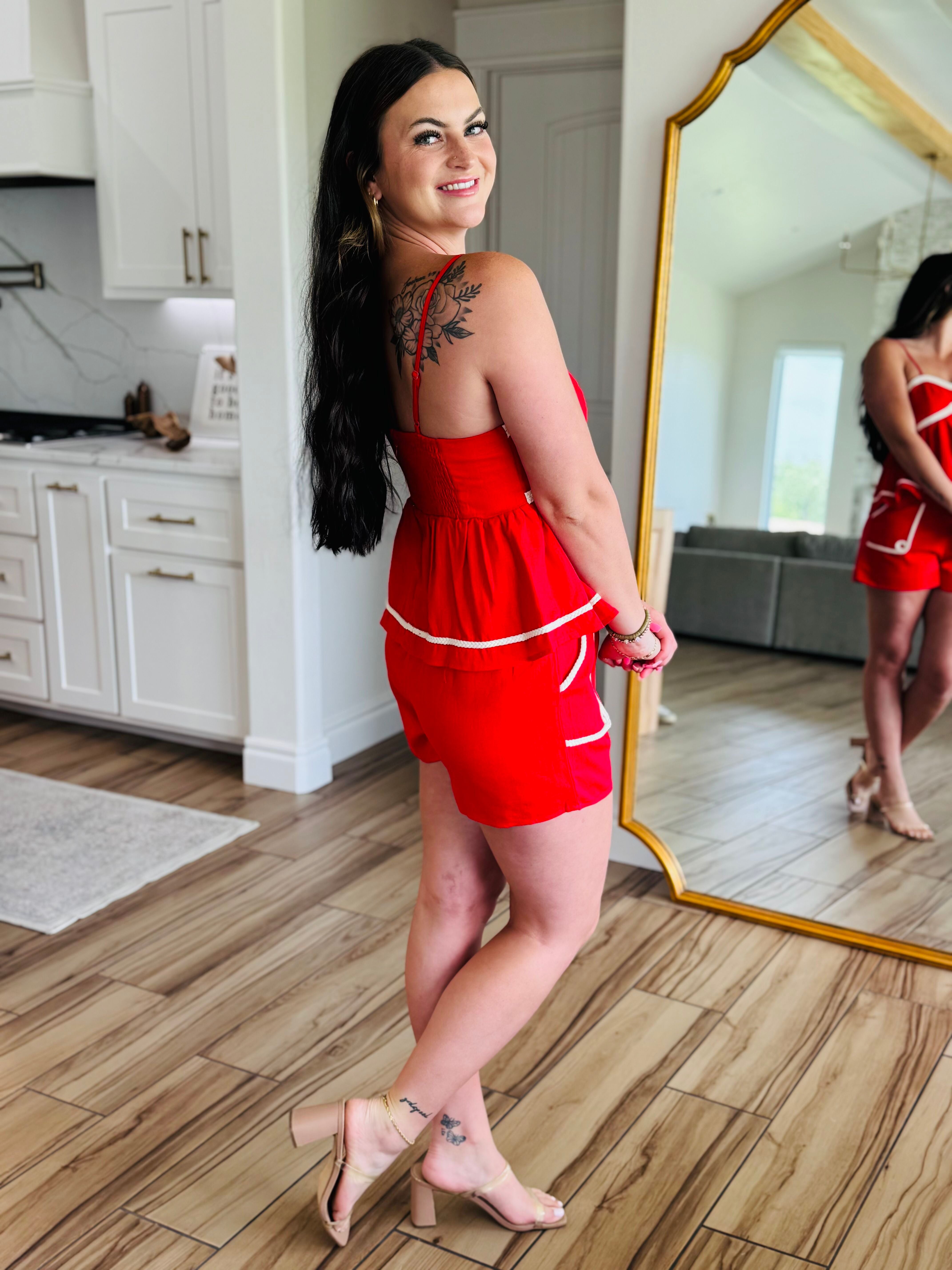 Full outfit shot of the RED BRAID TRIM DETAIL LINEN SHORT SET, perfect for beach outings or brunch dates, exuding coastal charm and effortless elegance.