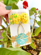 IRIDESCENT FLOWER TOP HOOPS-YELLOW showcasing a soft and lightweight design for elegant or sassy dressing, perfect for any occasion.