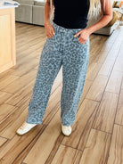 Close-up view of Blue Leopard Denim Jeans featuring a flattering fit and fierce leopard pattern, perfect for confident outfit choices.