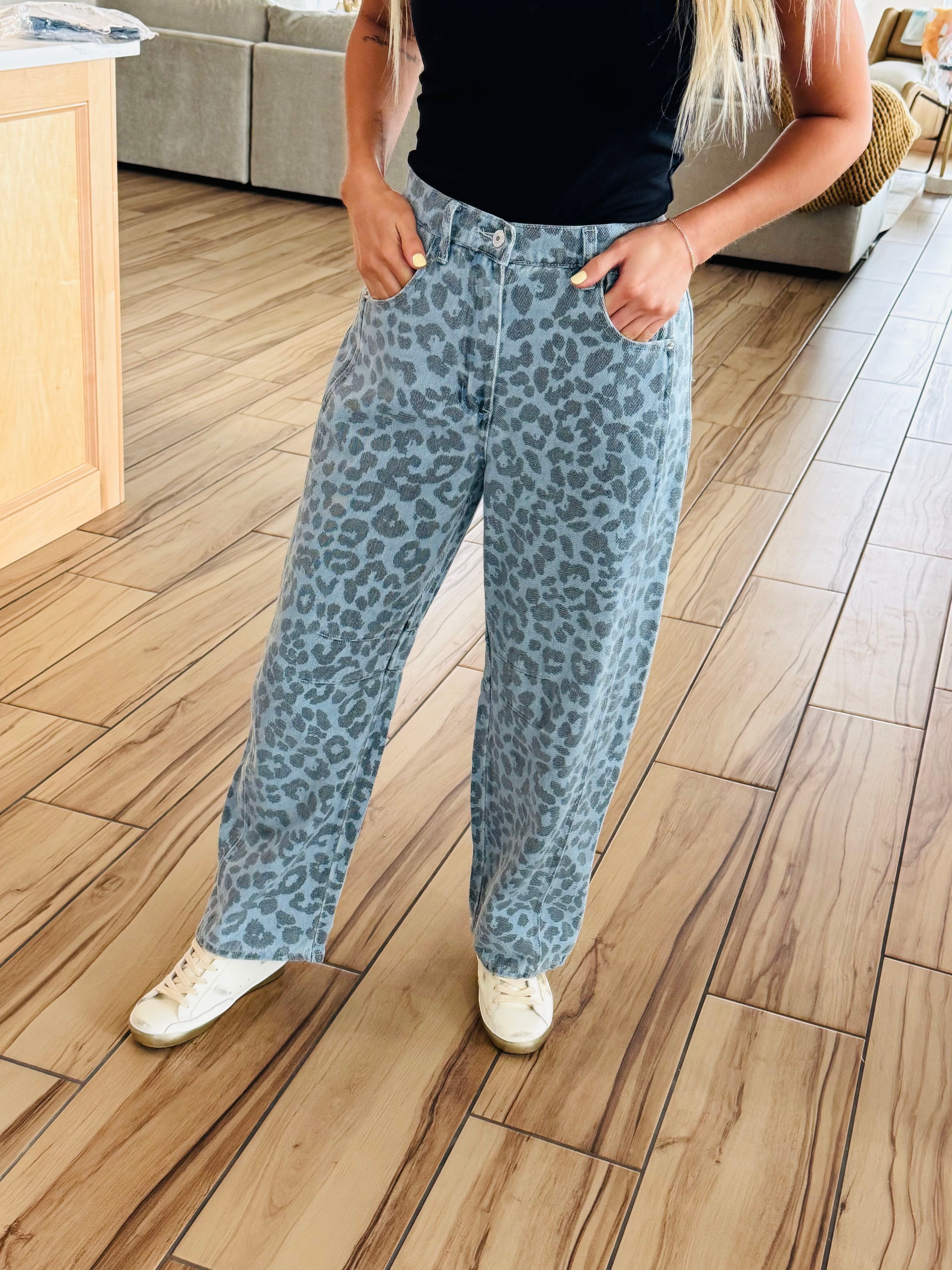 Close-up view of Blue Leopard Denim Jeans featuring a flattering fit and fierce leopard pattern, perfect for confident outfit choices.