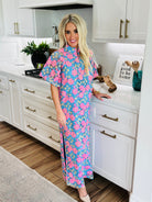 Full-length view of the Leighton Pansy Maxi Dress by Buddy Love, ideal for adding elegance and floral beauty to your wardrobe.
