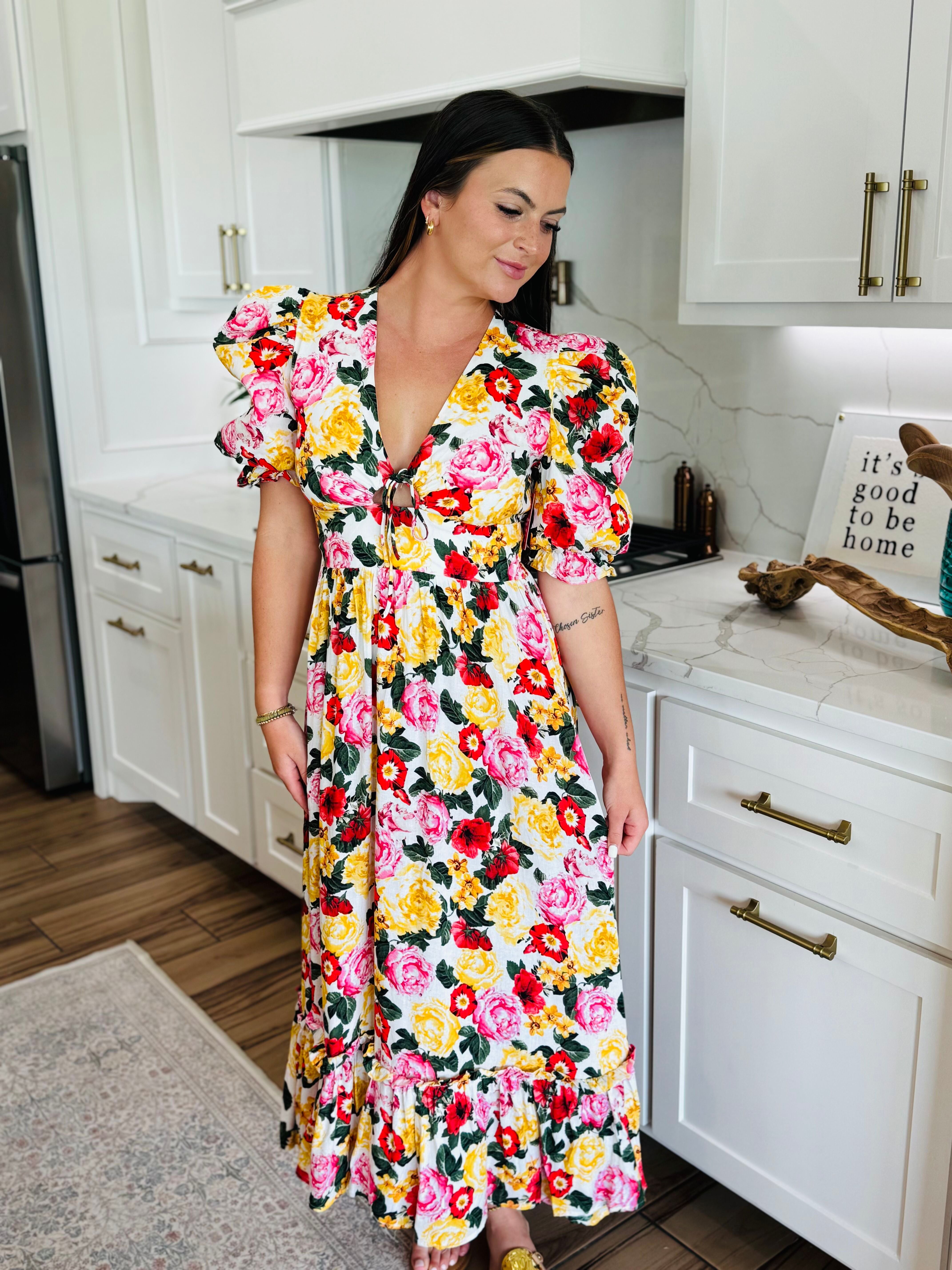 The back view of Miranda Puff Sleeve Maxi Dress by Buddy Love showcasing the smocked backing for a comfortable fit.