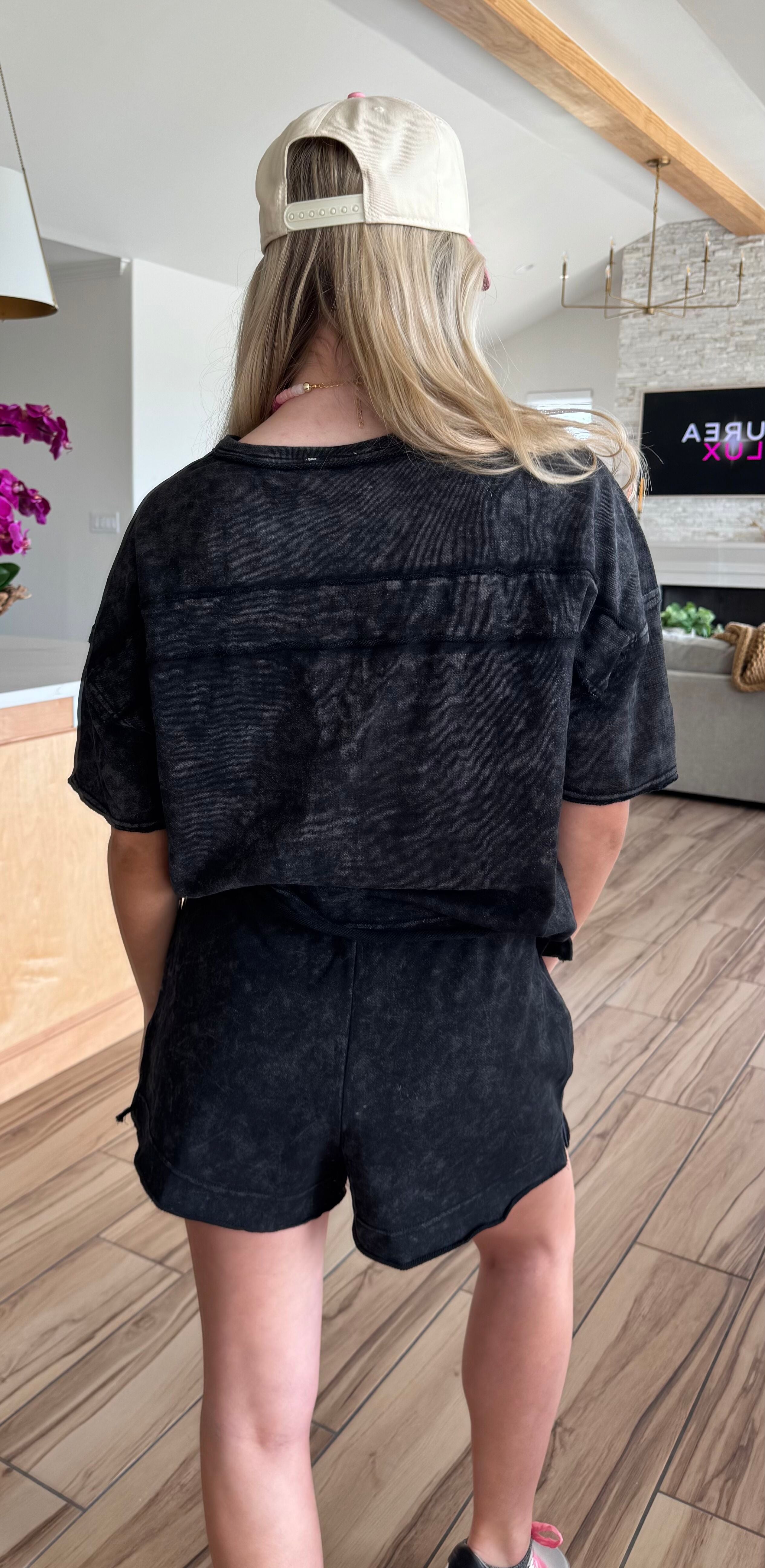 Stylish black mineral washed short set from Very J showcasing a relaxed fit and drawstring design, ideal for casual outings or relaxed home wear.