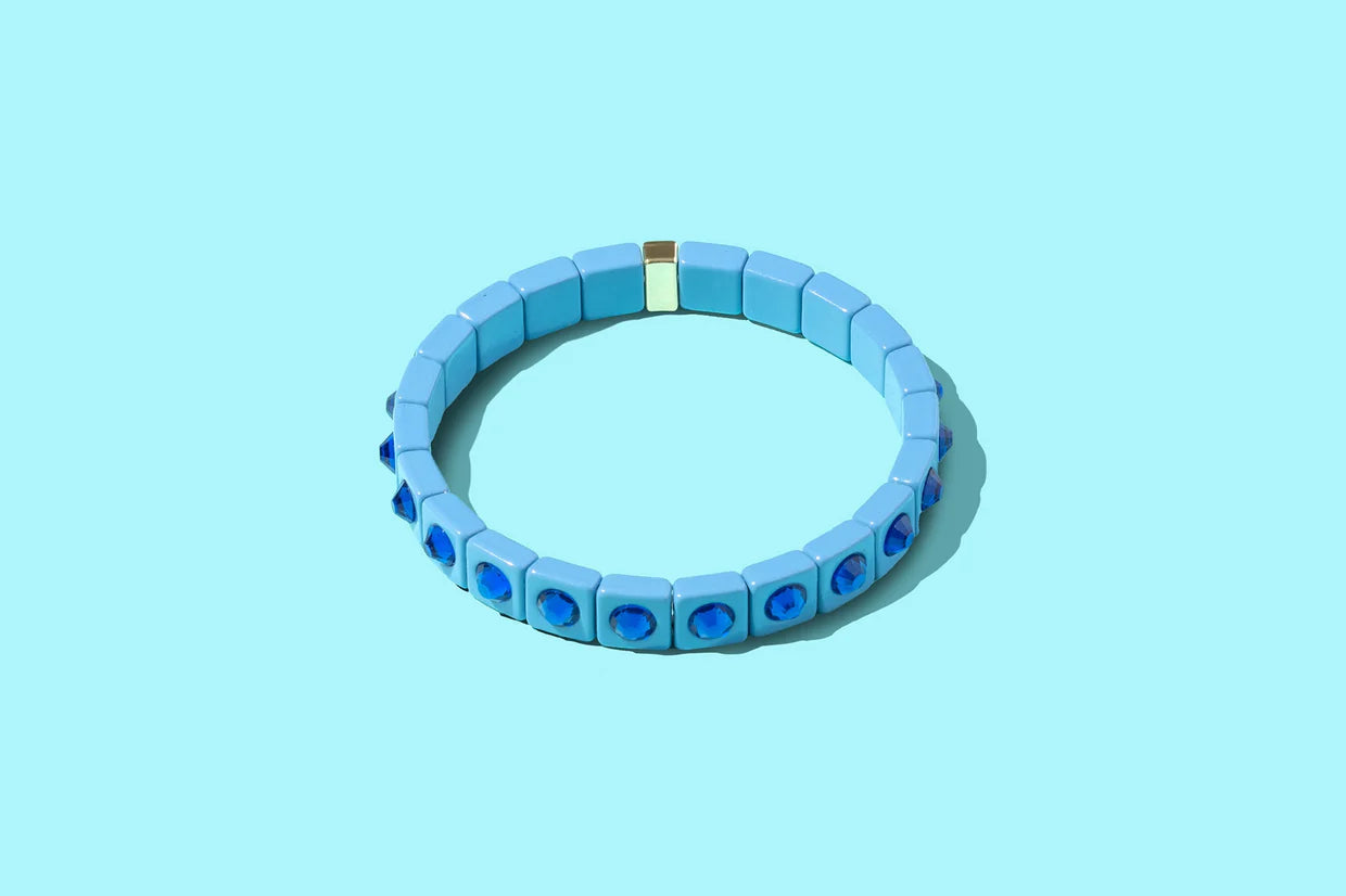 Close-up view of the Maeve Enamel Bracelet - Elegant Stretch Bracelet featuring a modern design that adds sophistication to any outfit.