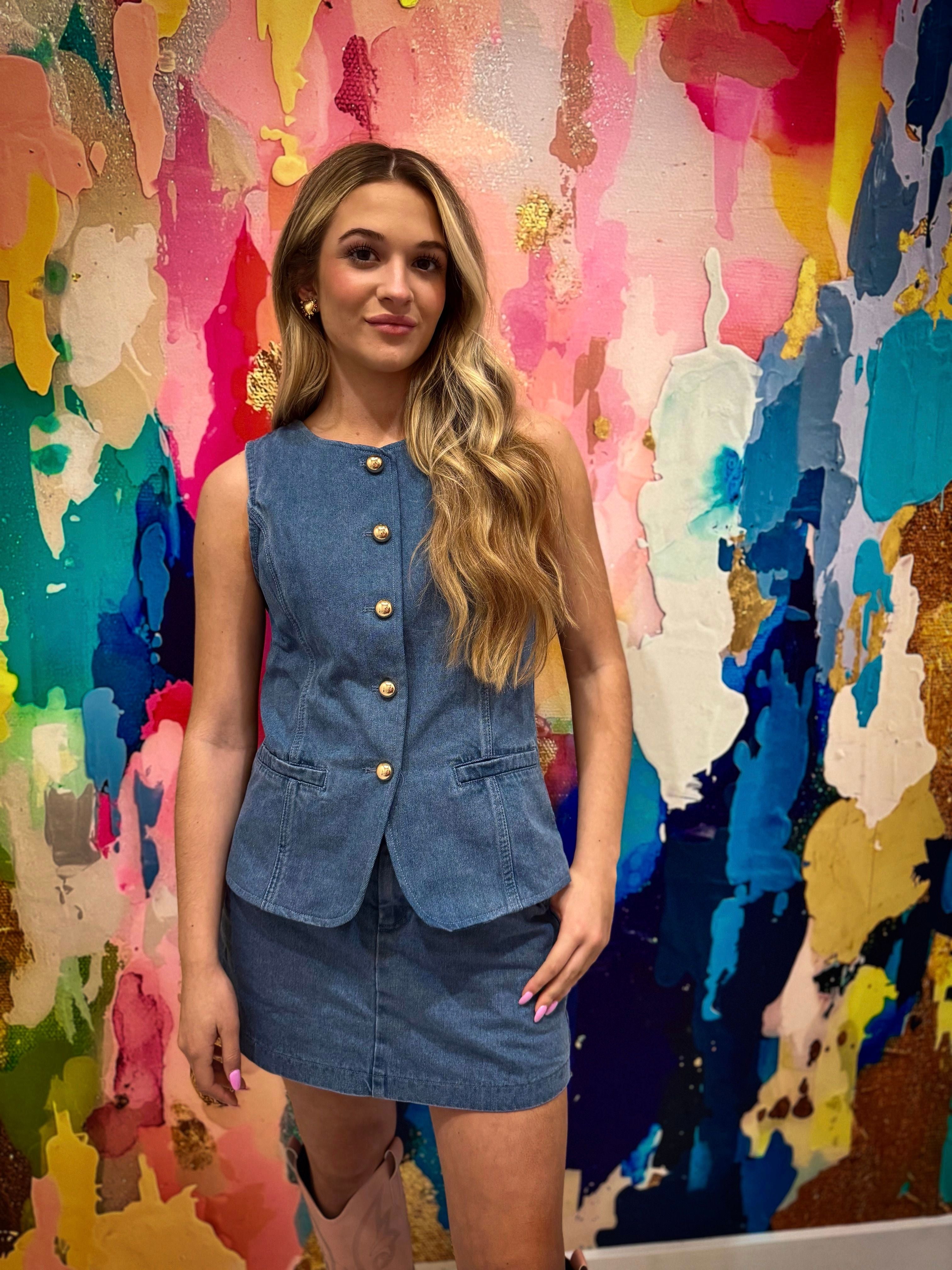 Denim Vest and Skort Set with Gold Buttons - Versatile and trendy wardrobe staple ideal for various occasions, emphasizing fashion and comfort.