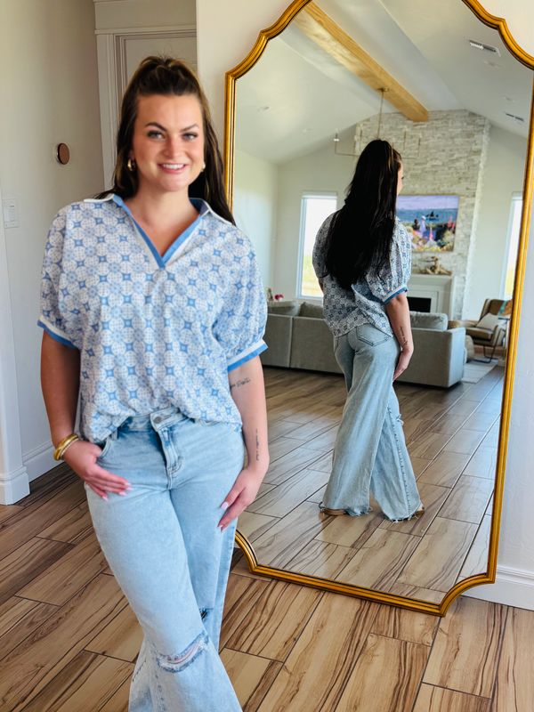 Lightweight and stylish ENTRO Chambray Top ideal for warmer days, showcasing versatility.