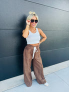 BROWN SOLID HIGH WAIST DRAWSTRING WIDE LEG PANTS BY ENTRO - Bottoms