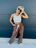 BROWN SOLID HIGH WAIST DRAWSTRING WIDE LEG PANTS BY ENTRO - Bottoms