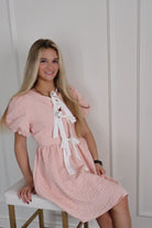 Bubble Textured Mini DressBubble Textured Bow Tie Front Mini Dress with Bubble SleevesAurea Lux Collective