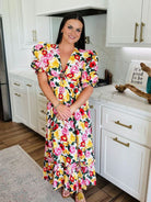 Model wearing the Miranda Puff Sleeve Maxi Dress by Buddy Love, perfect for weddings and brunch occasions.