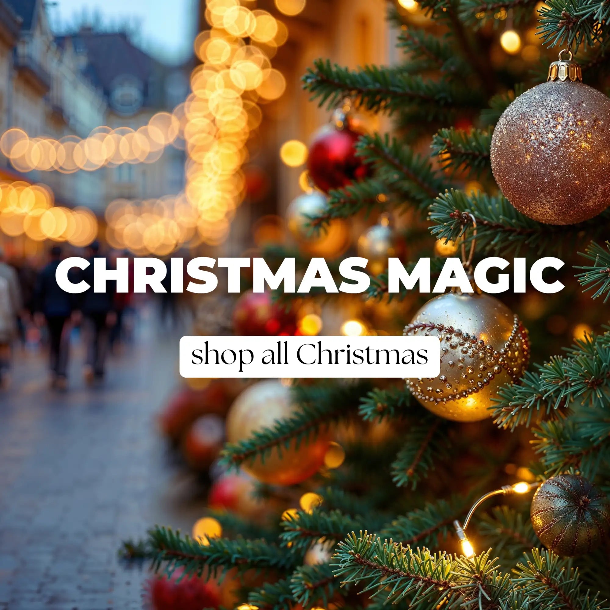 Christmas tree with gold ornaments and red baubles, adorned in shiny metallic finish.