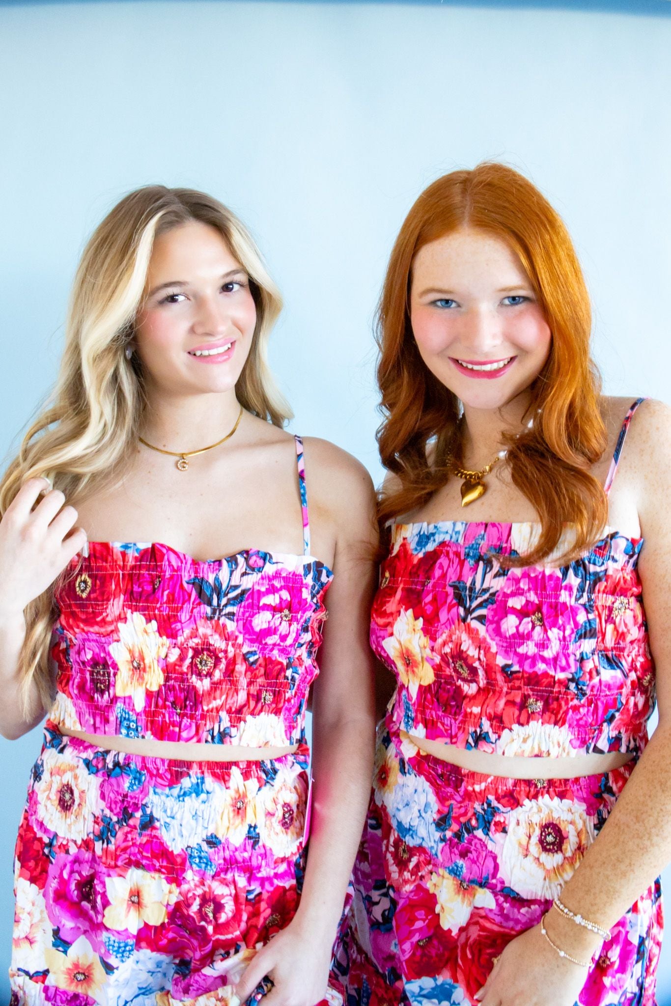 Stylish Tamra Jubilee Top and Maxi Skirt Set by Buddy Love featuring a fully smocked cropped tank top with adjustable straps and a maxi-length skirt with a smocked waist, perfect for summer vacations.