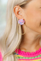 Stylish Iridescent Flower Top Hoops in Pink by Taylor Shaye, perfect for elegant or casual dressing.